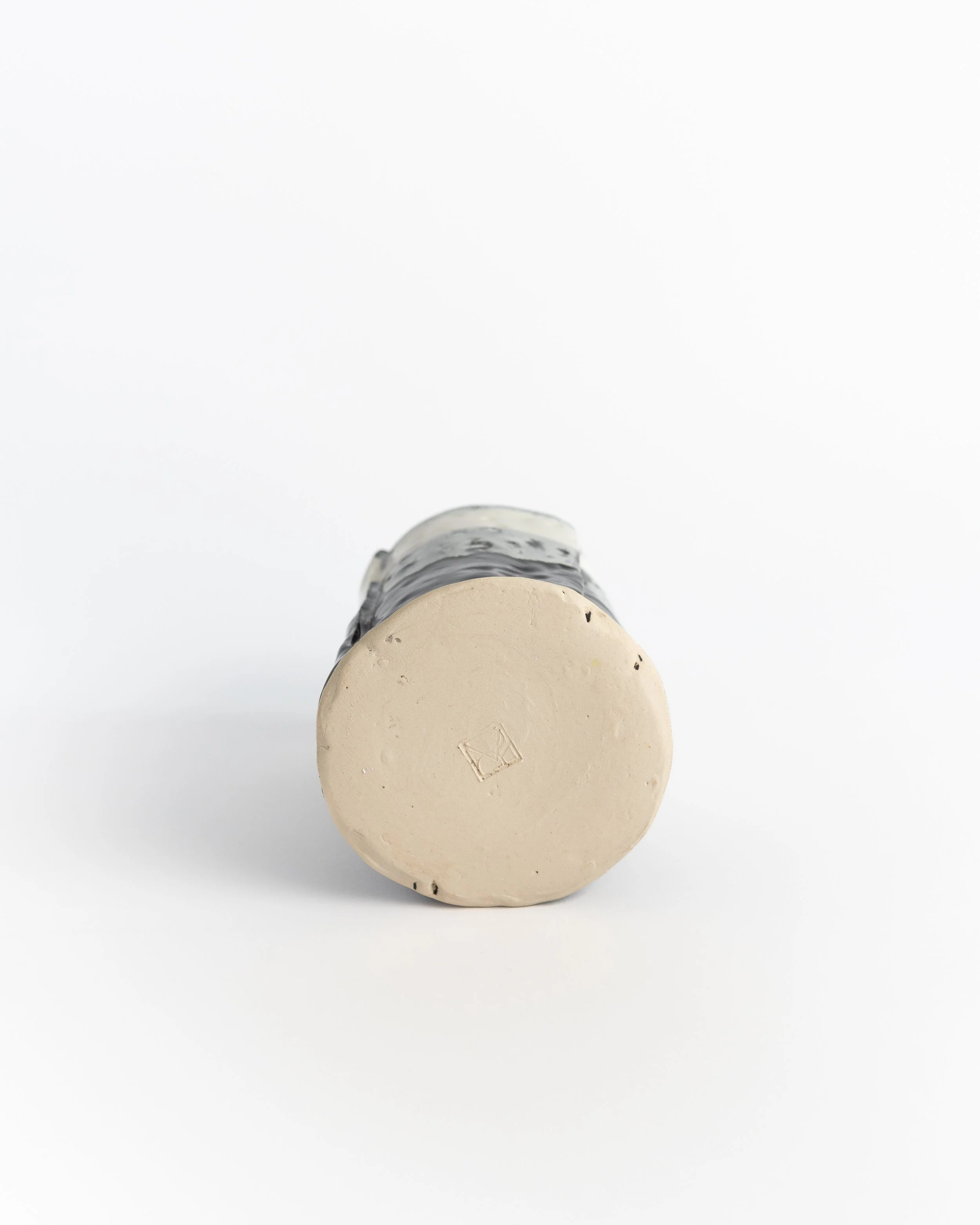 Underside of Snowline Tumbler showing the unglazed foot and maker's mark.