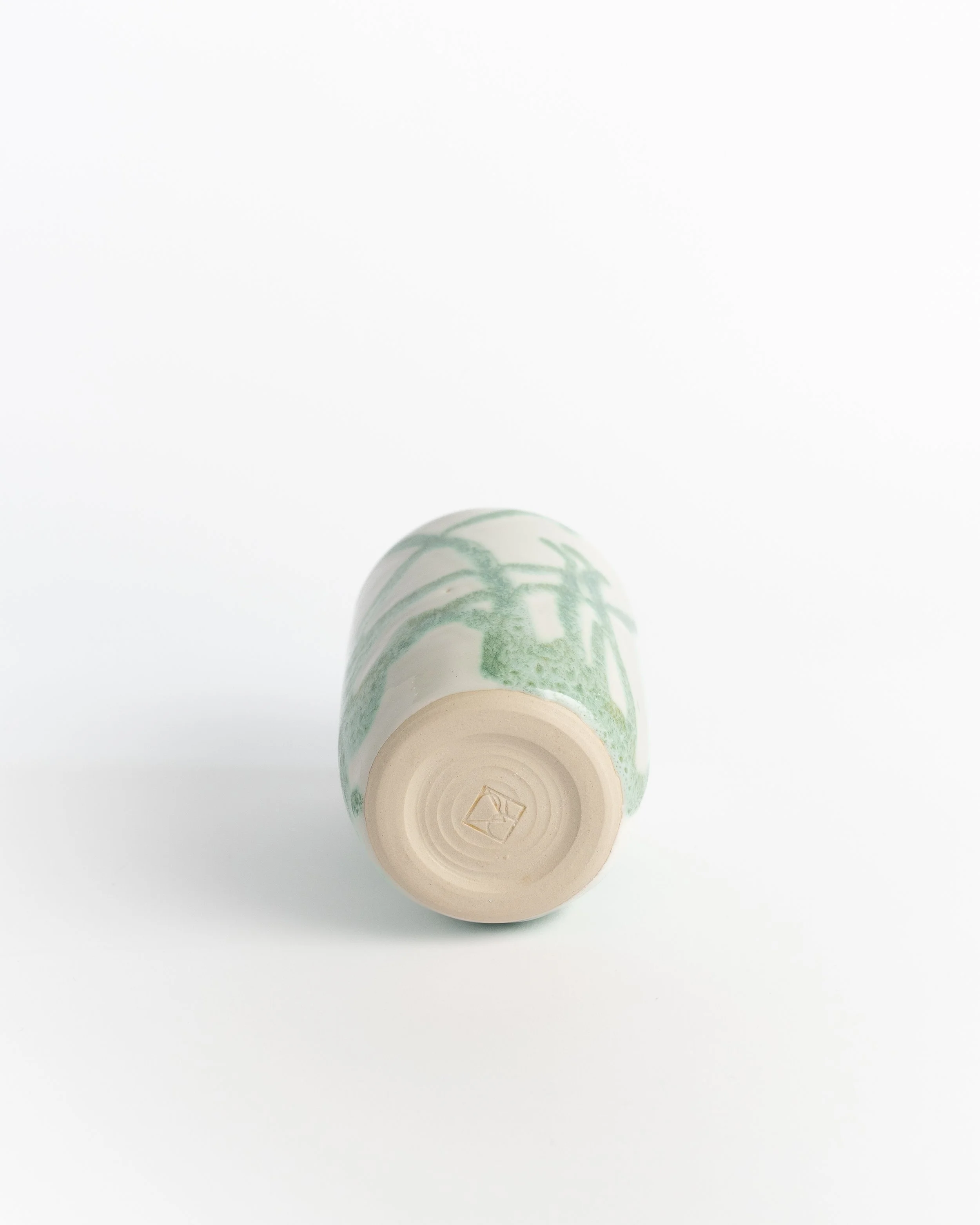Underside of Ivy Tumbler showing the unglazed foot and maker's mark.