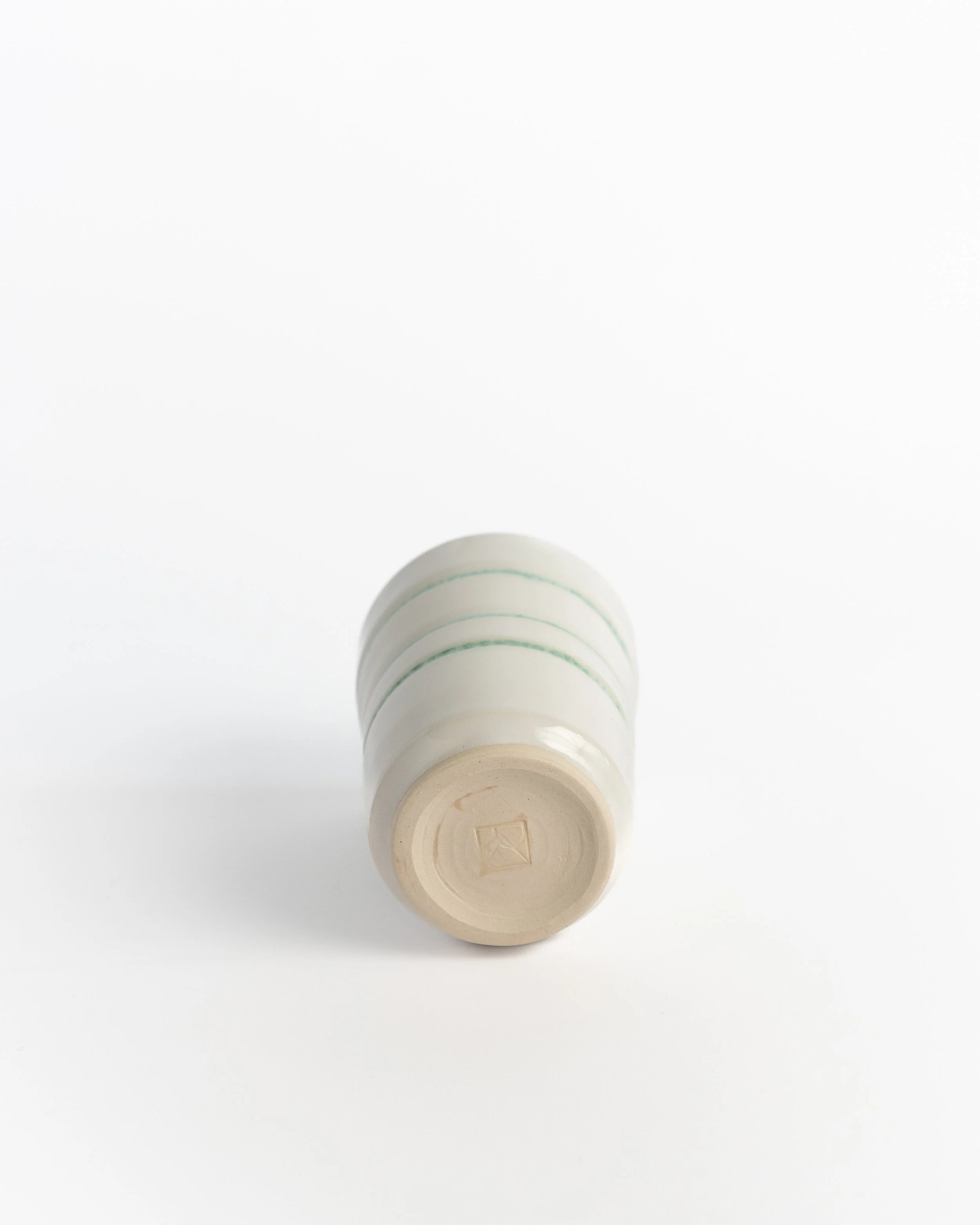 Underside of Ribbon Tumbler showing the unglazed foot and maker's mark.