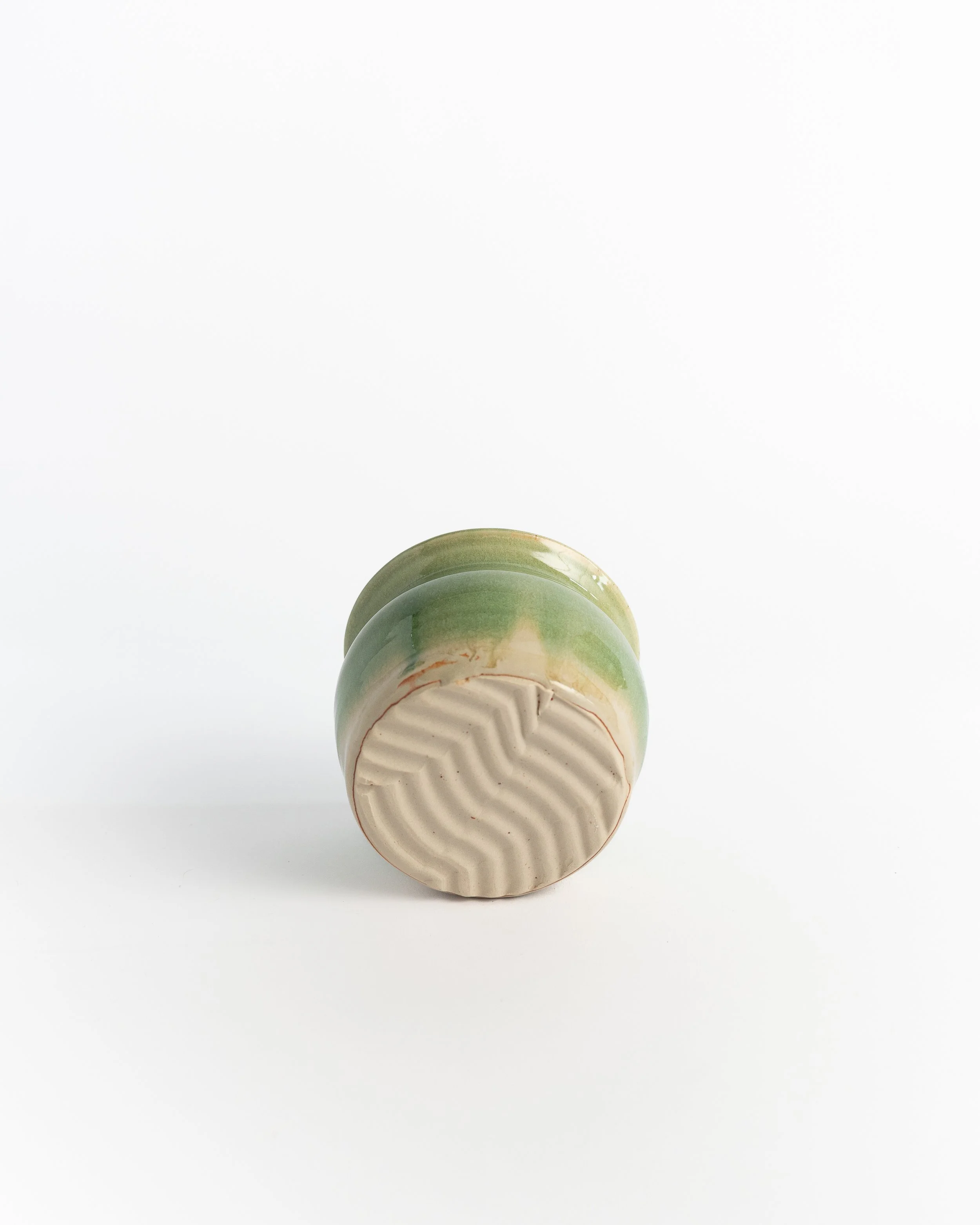 Underside of Sage Lidded Jar showing the unglazed foot and maker's mark.