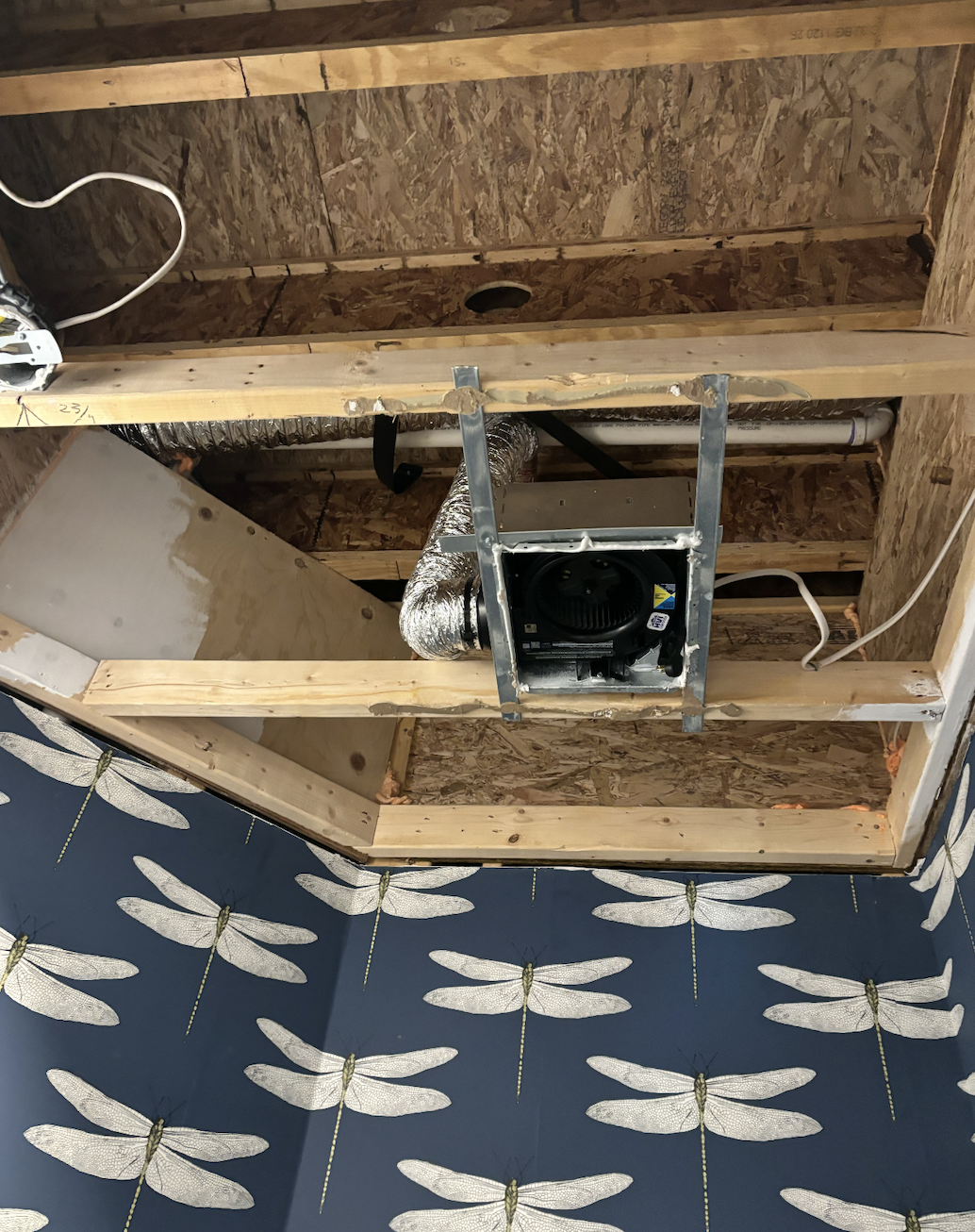 This is the fan exhaust in the second floor powder room. This was one of the first issues we saw. Without explanation the fan began leaking and then would spout water like a sprinkler. The theory here was that there was negative pressure in the house