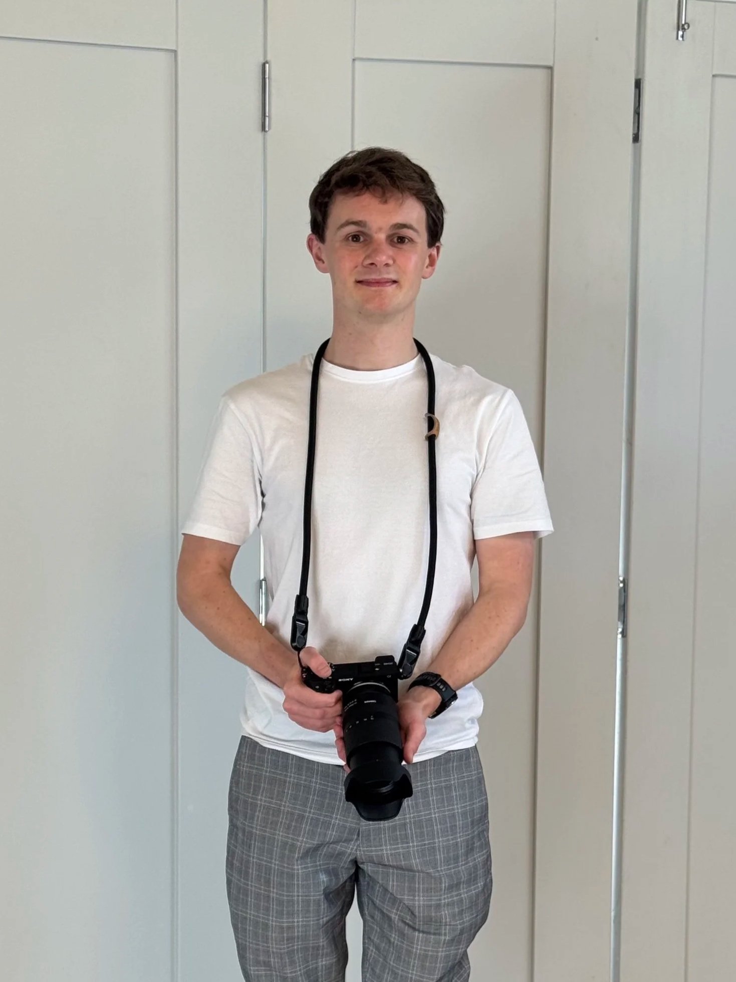 Davidson Photography with Camera in Hand