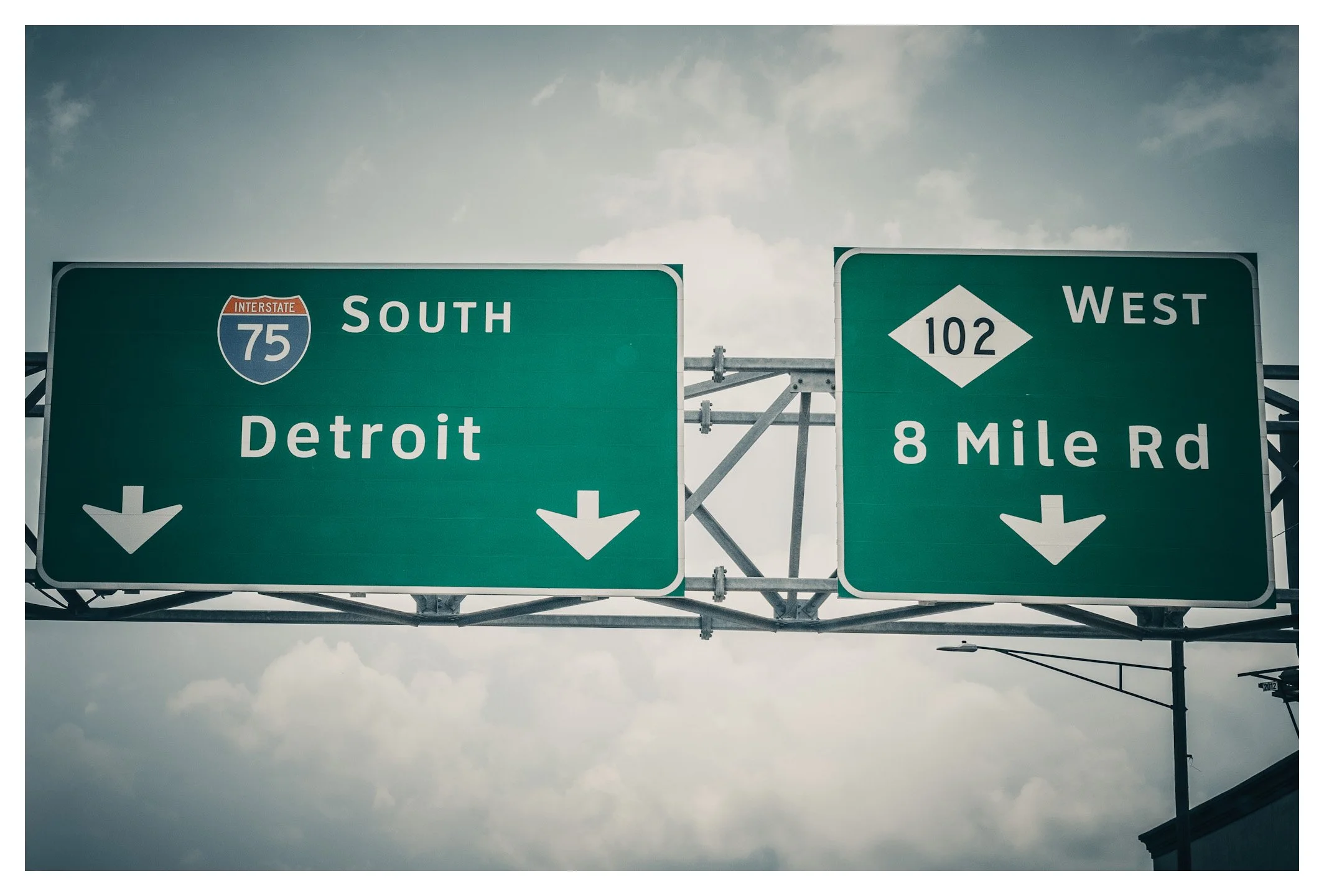 The road to Detroit begins long before the skyline appears on the horizon. Passing the iconic 8 Mile Road sign is a reminder that some places are more than destinations—they're part of American culture and history.