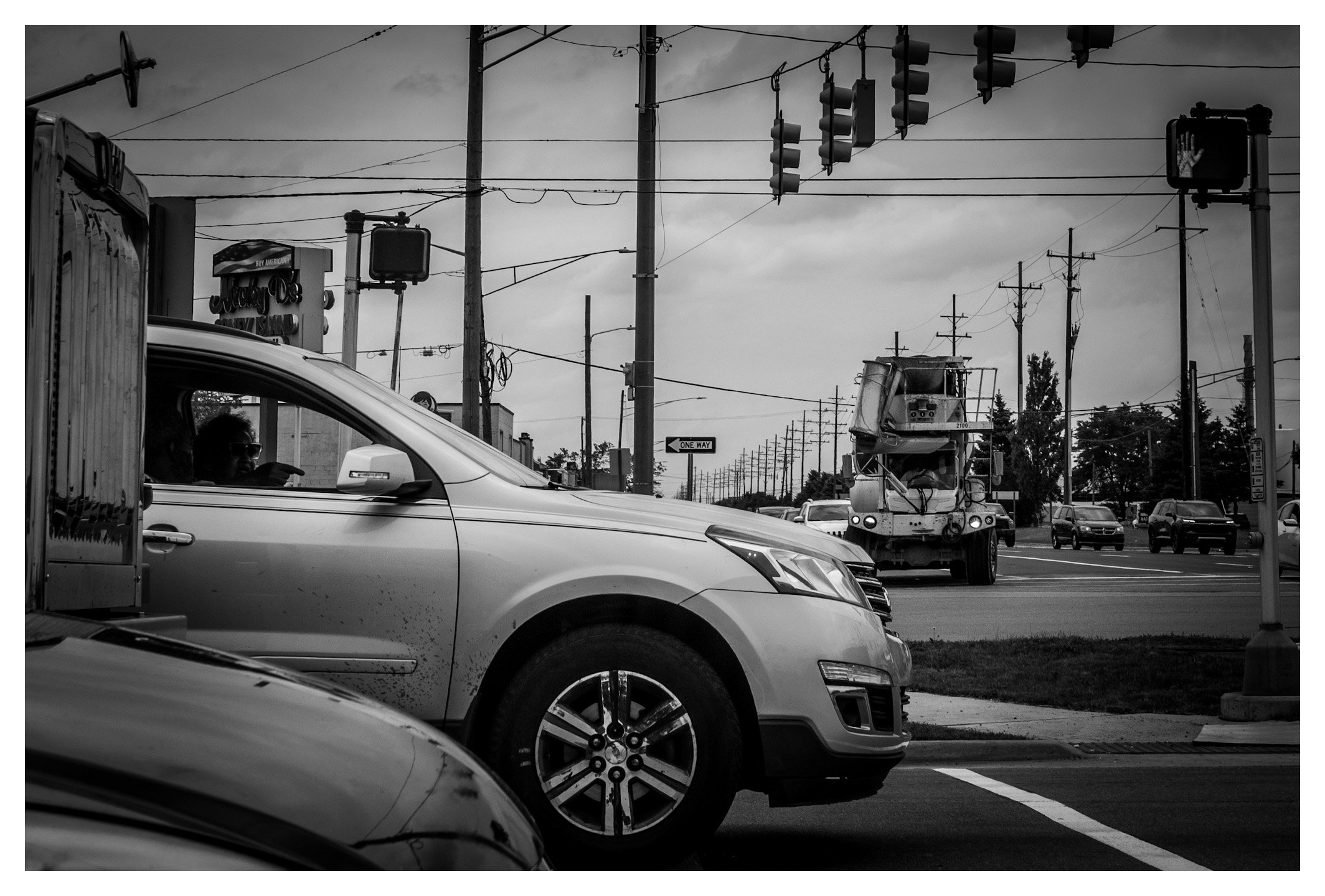 Detroit is not only defined by its skyline but also by the roads that keep the city moving. Even an ordinary intersection reflects the energy, industry, and everyday rhythm of life in the Motor City.