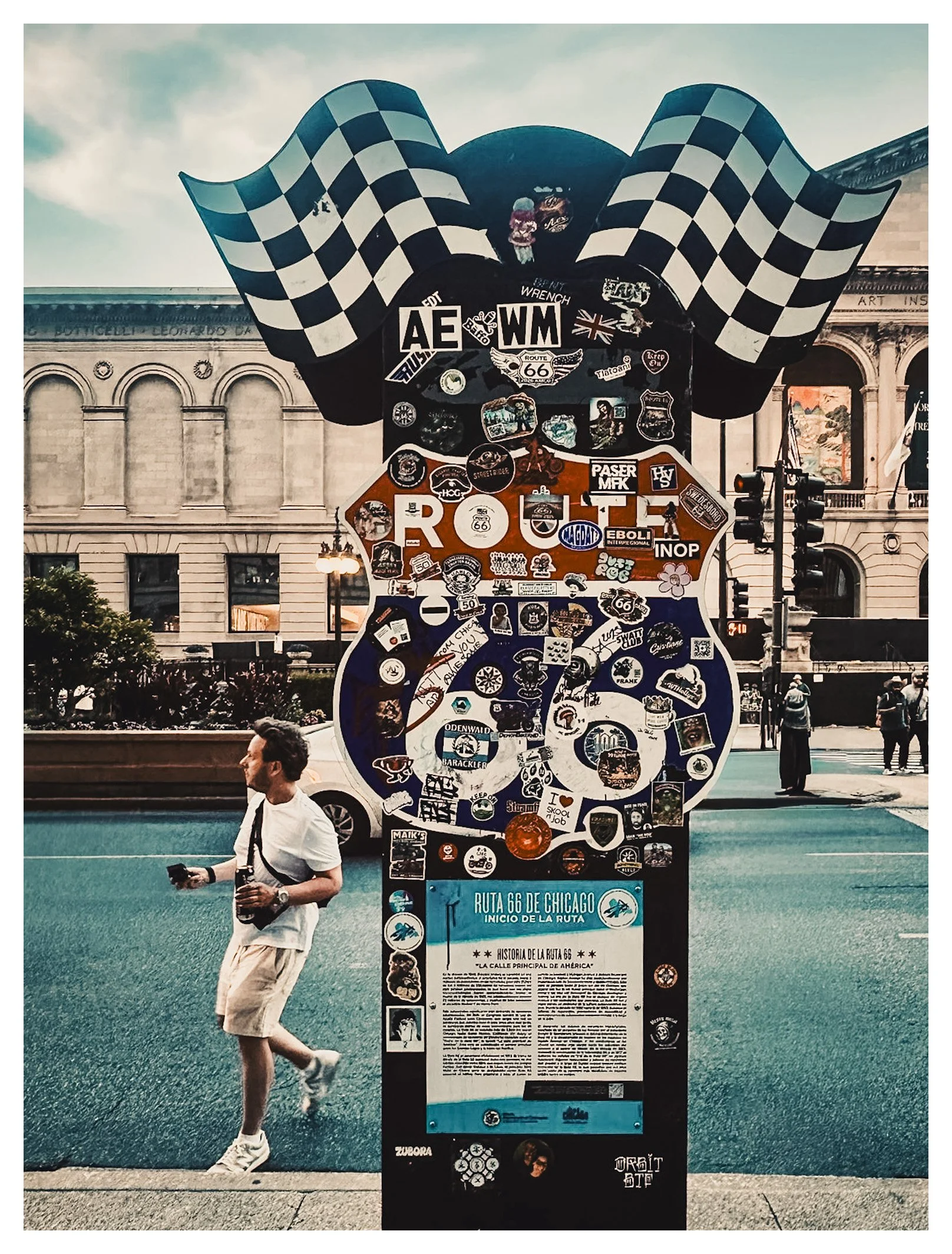 The historic Route 66 sign in downtown Chicago marks the beginning of one of the world's most iconic highways. A timeless symbol of exploration and the open road.