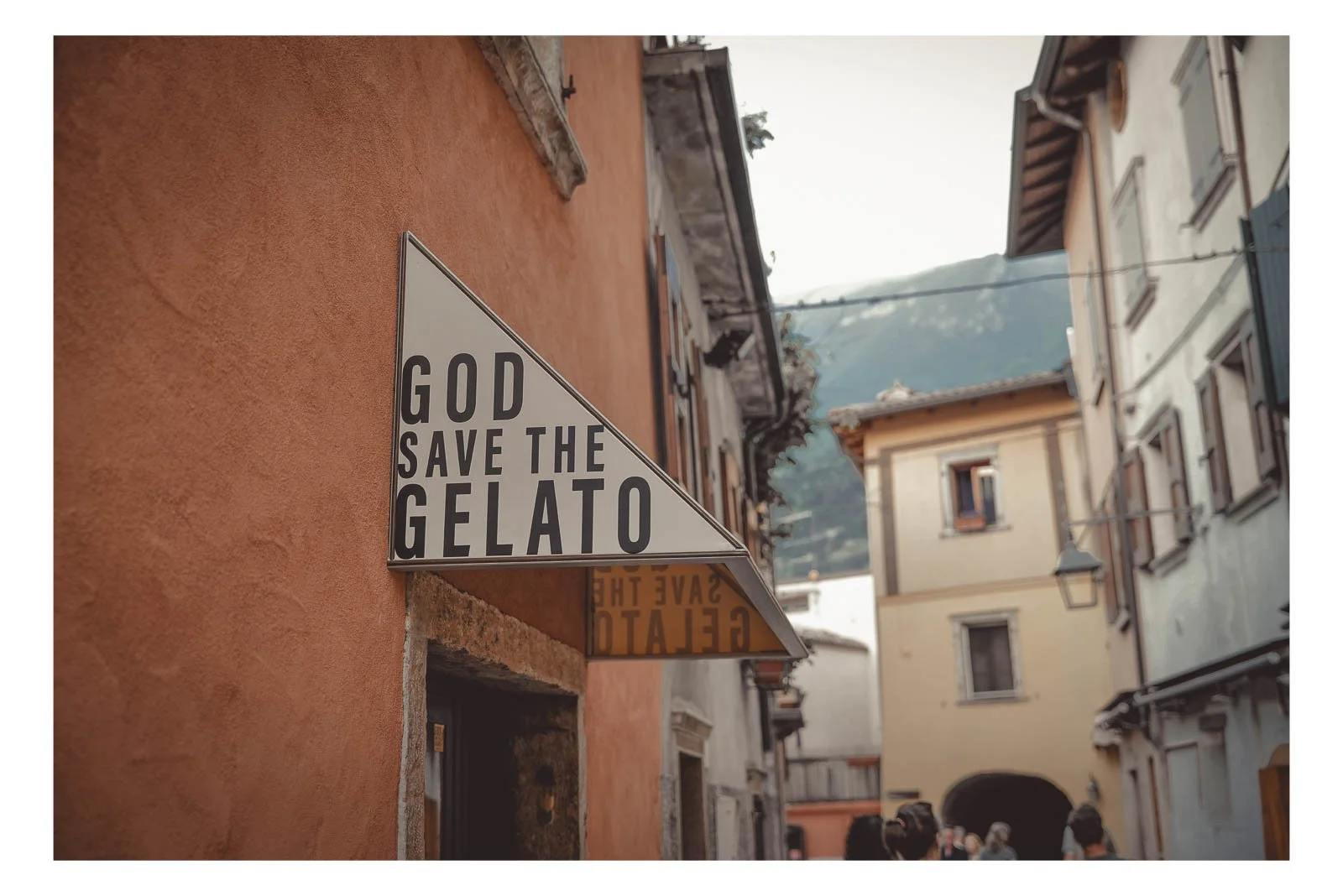 The God Save the Gelato sign adds humor and attitude to everyday street life.
Bold words turn a simple moment into a statement about culture and pleasure.
It’s a reminder that sometimes, small joys deserve royal treatment.
