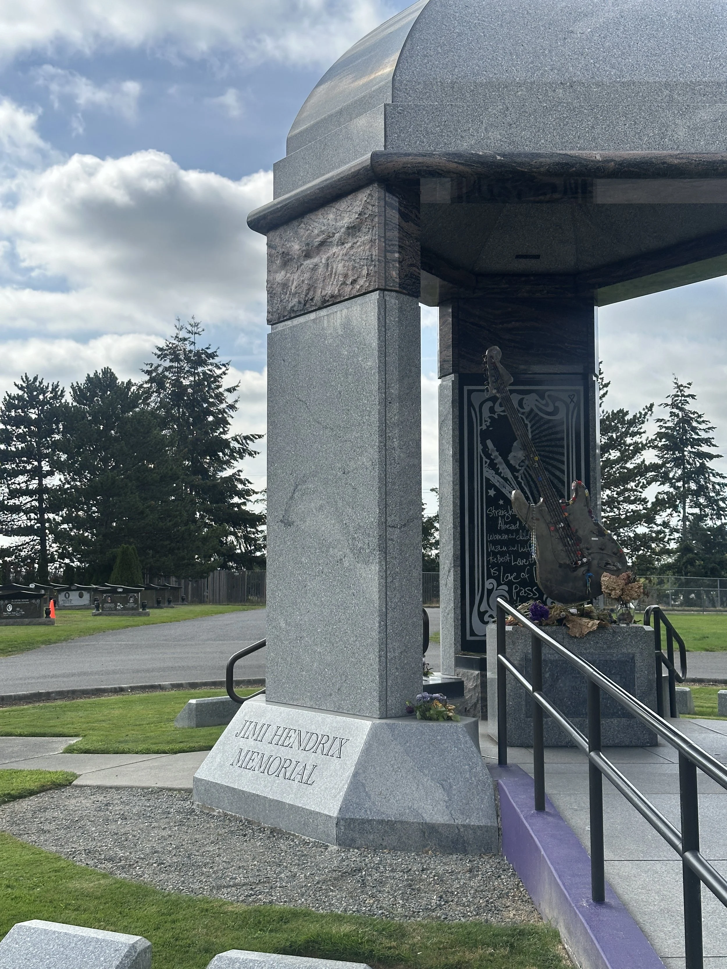 The Jimi Hendrix Memorial honors one of the most influential musicians in history.
Located in a quiet cemetery setting, it feels reflective, personal, and deeply emotional.
It’s a place where music, legacy, and silence come together in a powerful way