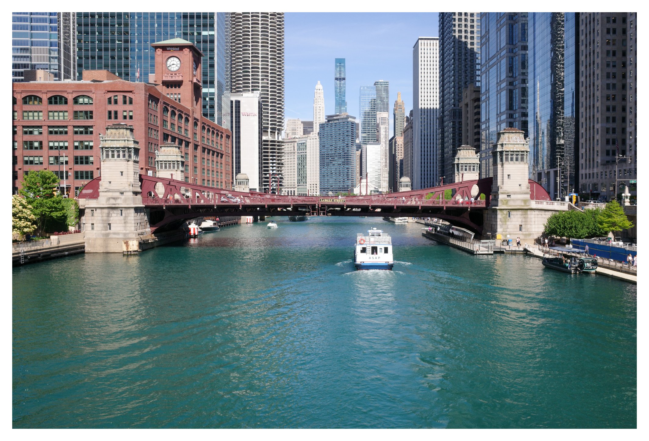 Historic bridges, turquoise water, and a world-famous skyline define downtown Chicago. A timeless perspective on one of America's greatest cities.
