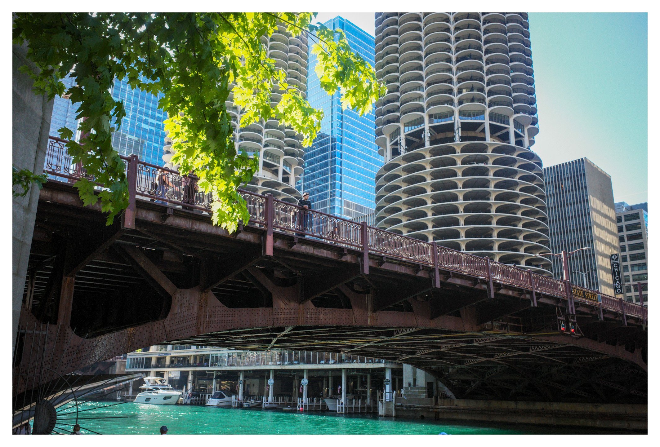 Chicago's famous Marina City towers have become a symbol of the city's innovative architecture. Framed by the river and the State Street Bridge, they define the city's unmistakable skyline.