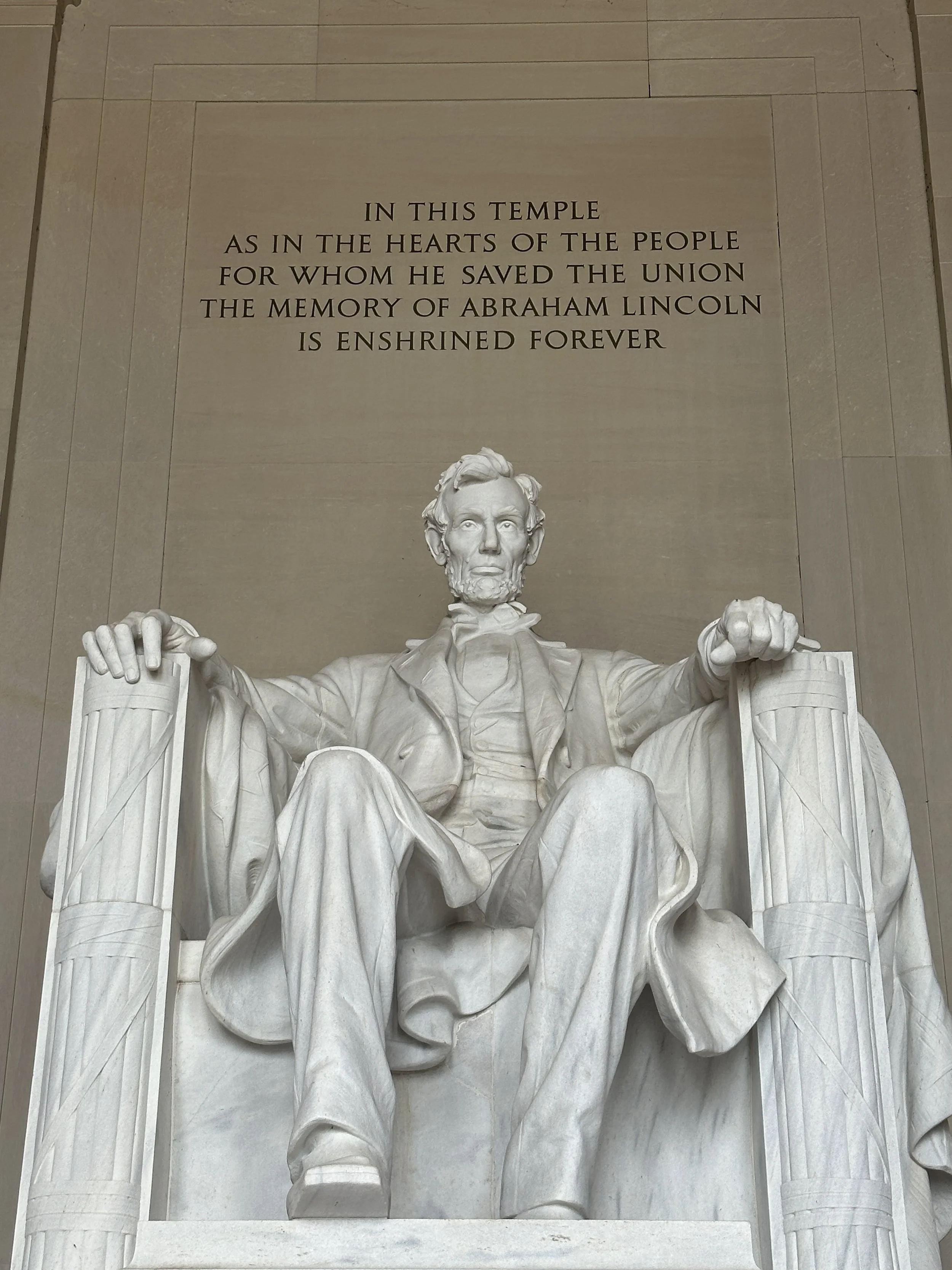 The Lincoln Memorial stands as a powerful symbol of unity and reflection.
The monumental statue of Abraham Lincoln conveys calm strength and historical weight.