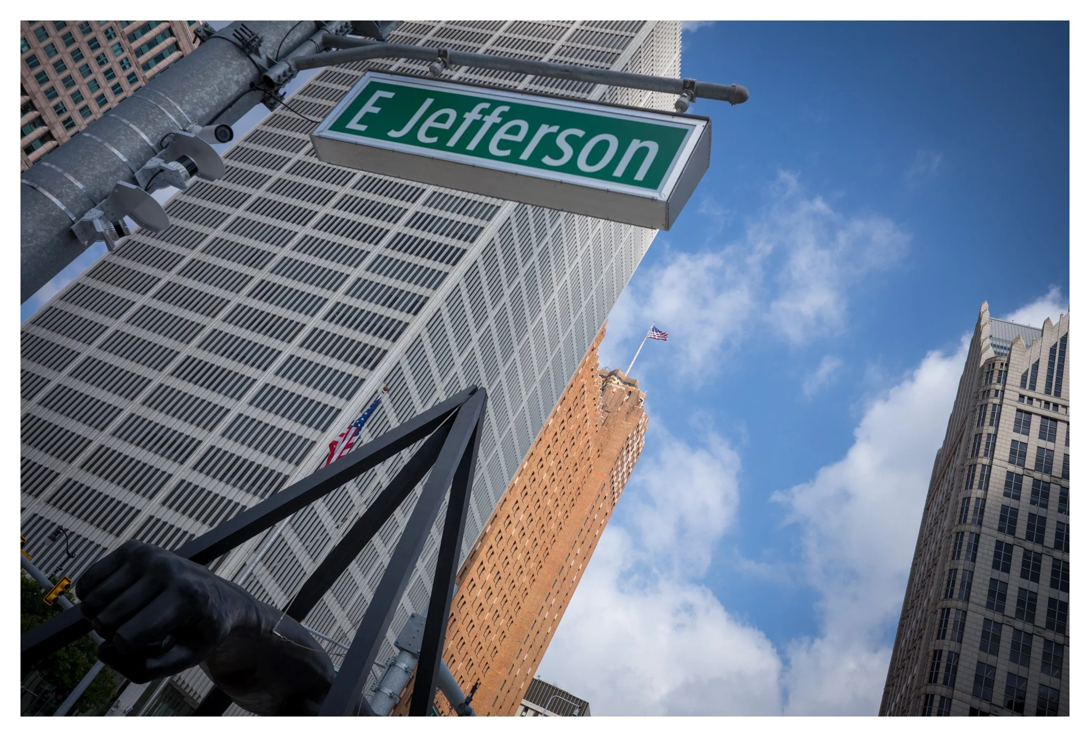 Jefferson Avenue is one of Detroit's most iconic streets, connecting the city's historic past with its modern skyline. Looking up from its sidewalks reveals the scale, ambition, and timeless architecture that define downtown Detroit.