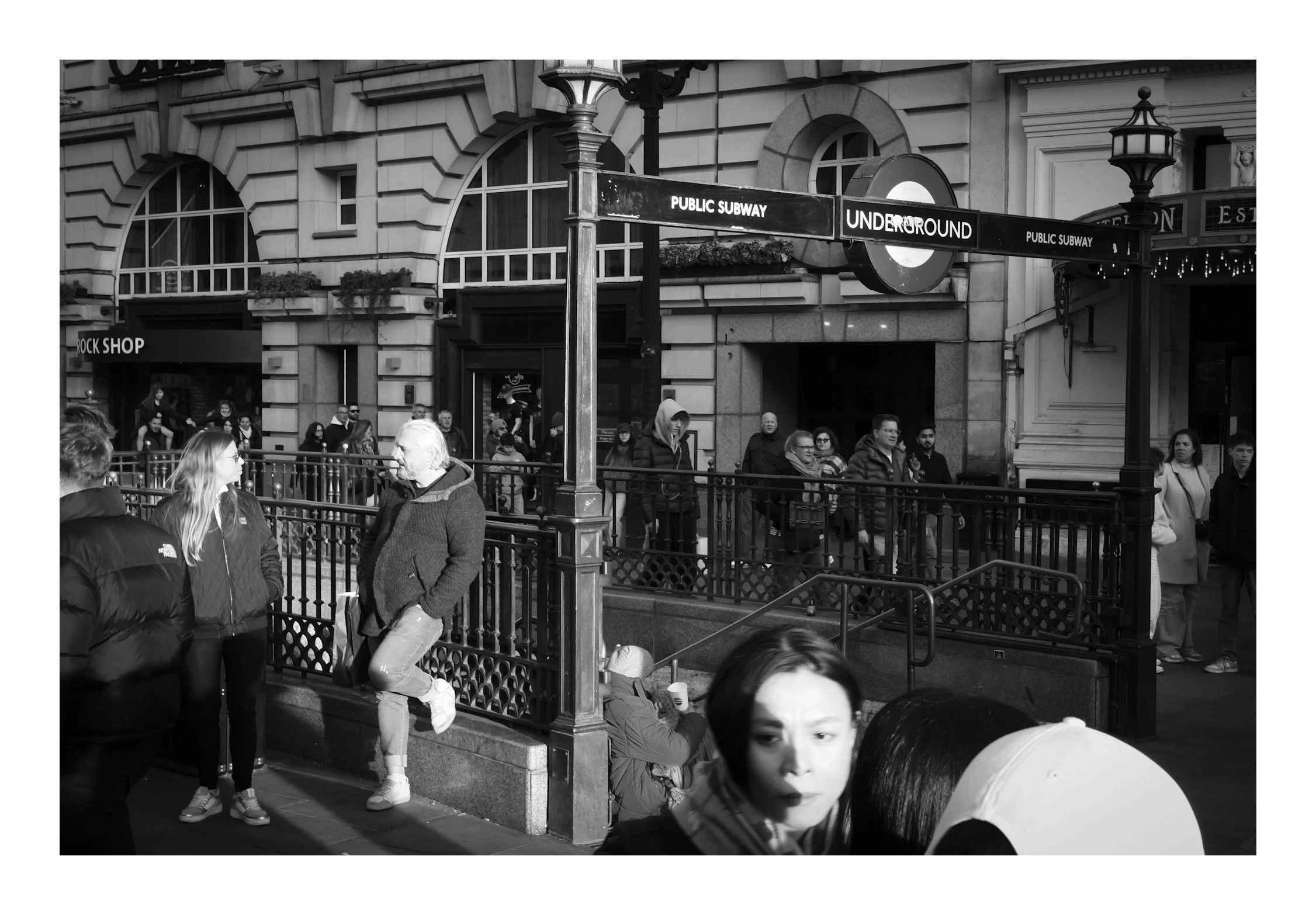At Piccadilly Circus Underground Station, the constant flow of people and motion reflects the heartbeat of London beneath the surface.