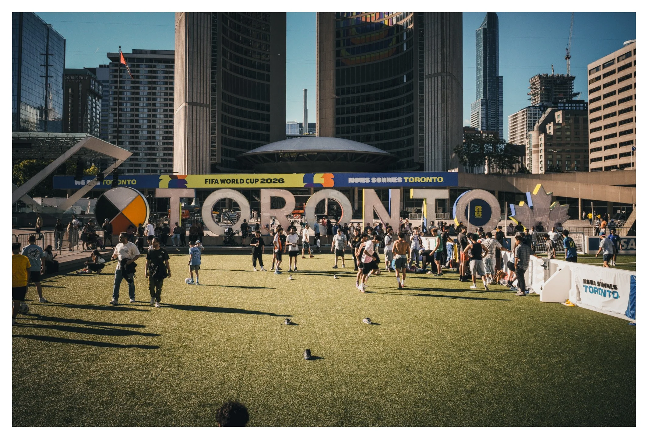 Nathan Phillips Square stands at the heart of Toronto, where locals and visitors gather year-round. A place that captures the city's welcoming spirit and international character.
