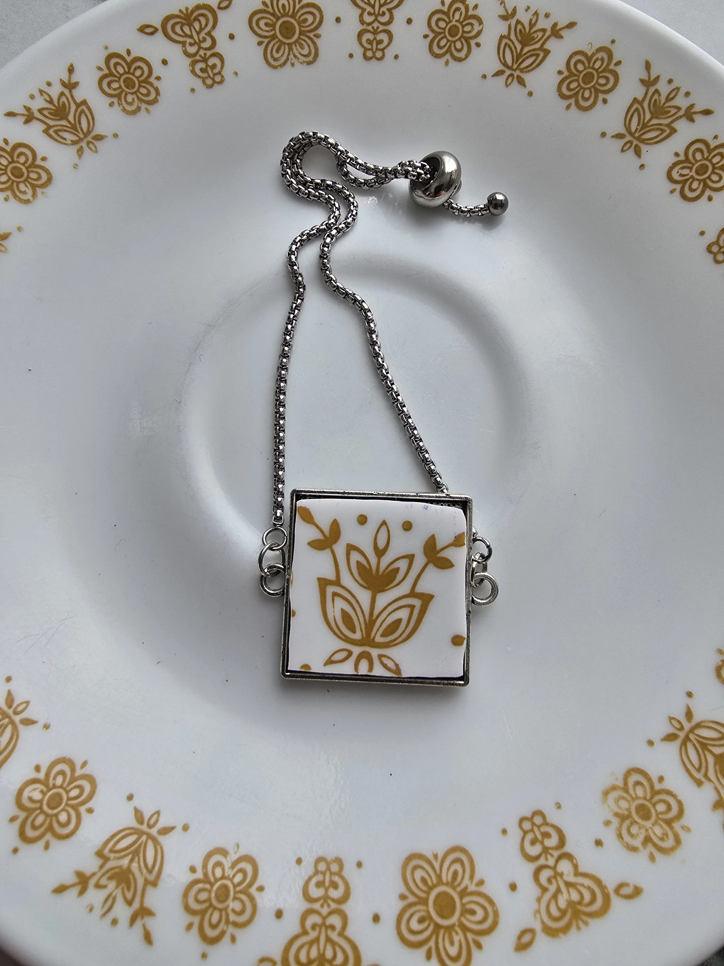 Gold Butterfly Corelle Broken plate bracelet