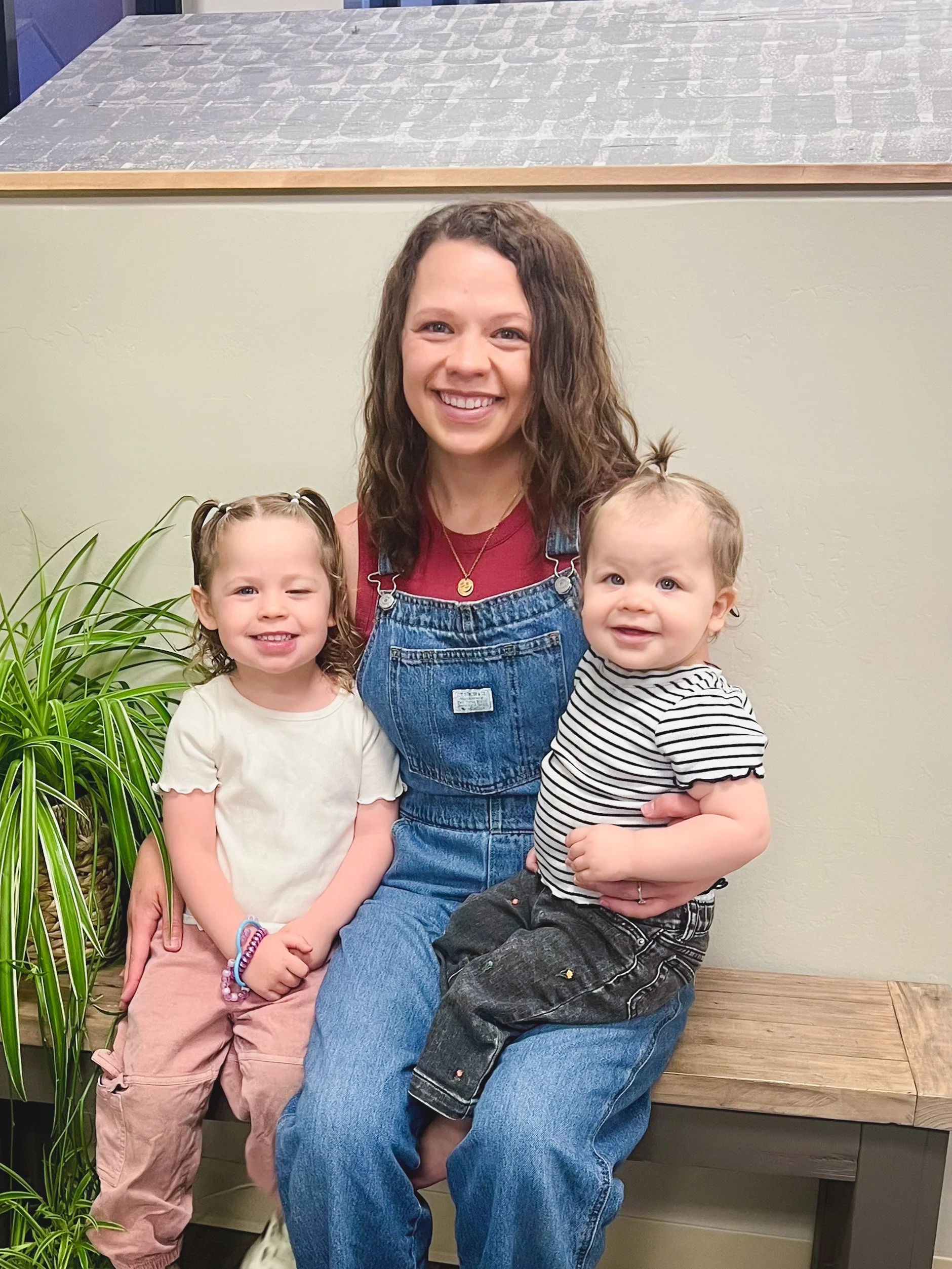 A Good Time Out parent with her two children, both enrolled since infancy