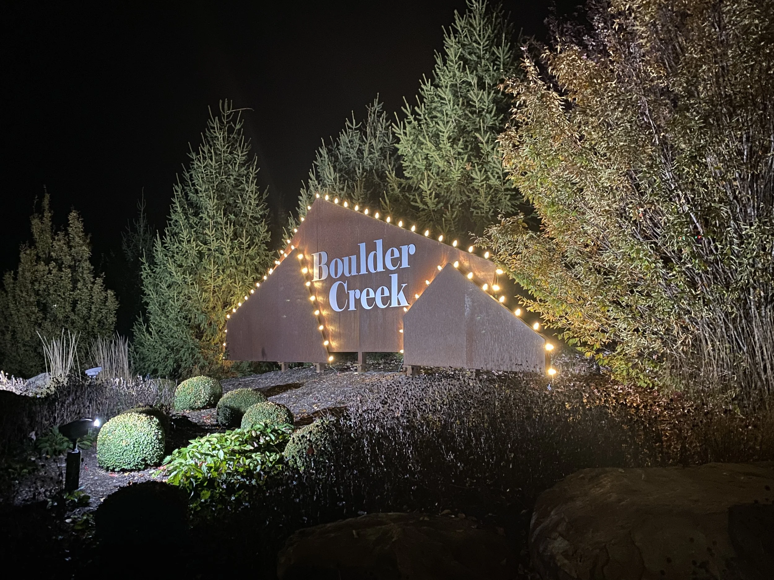 Christmas light design on entryway to a neighborhood