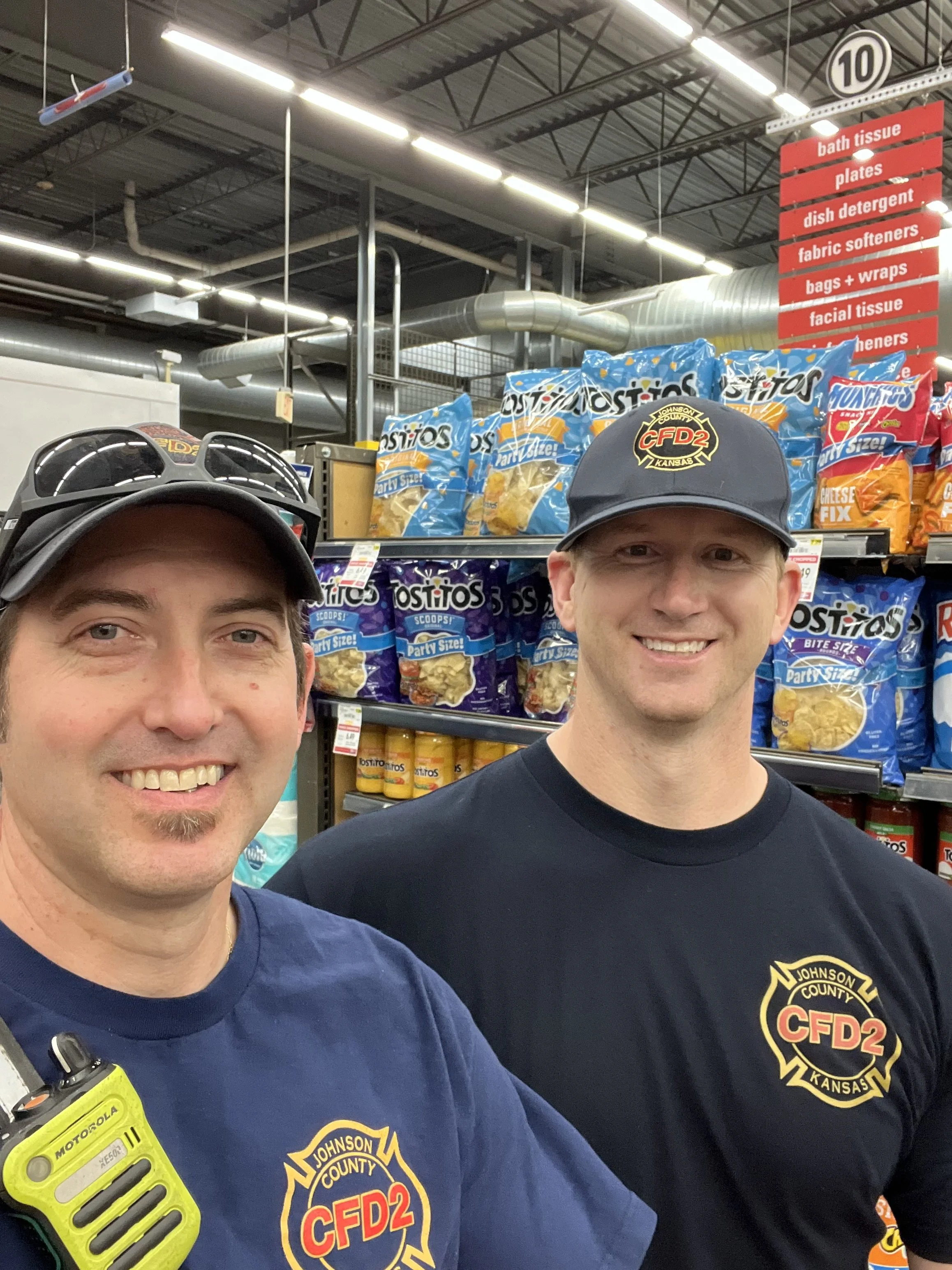 two firefighters at the grocery store
