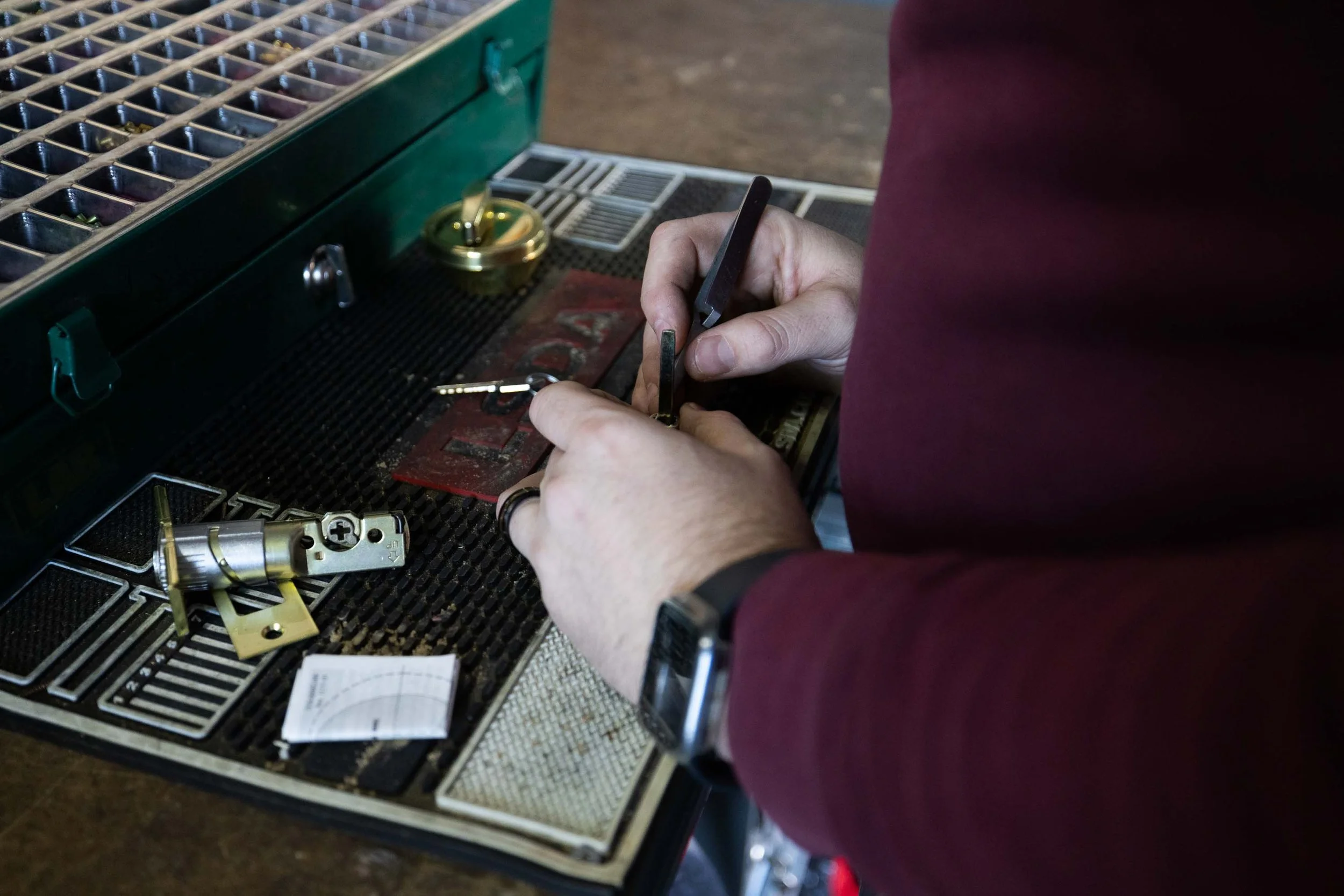 Locksmith providing on site service inside a vehicle in Harrisonburg VA, helping with car key and lock related needs.