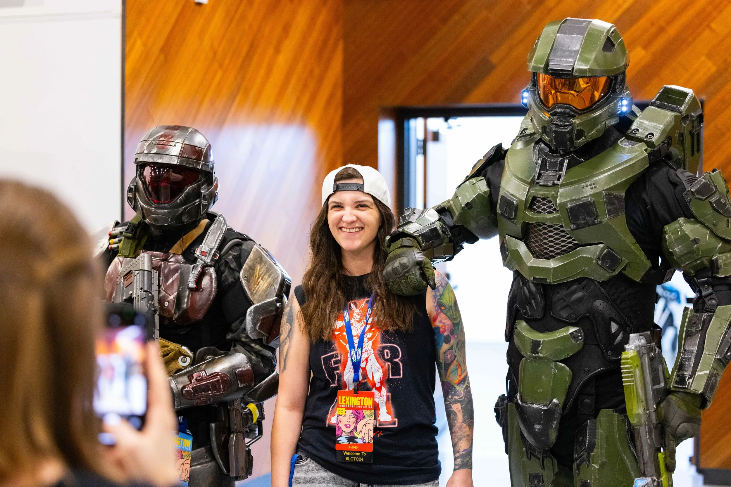 Attendee posing with Halo Spartan cosplayers at Lexington Comic Con in the Central Bank Center, featuring professional pop culture event photography by 859 Photography.