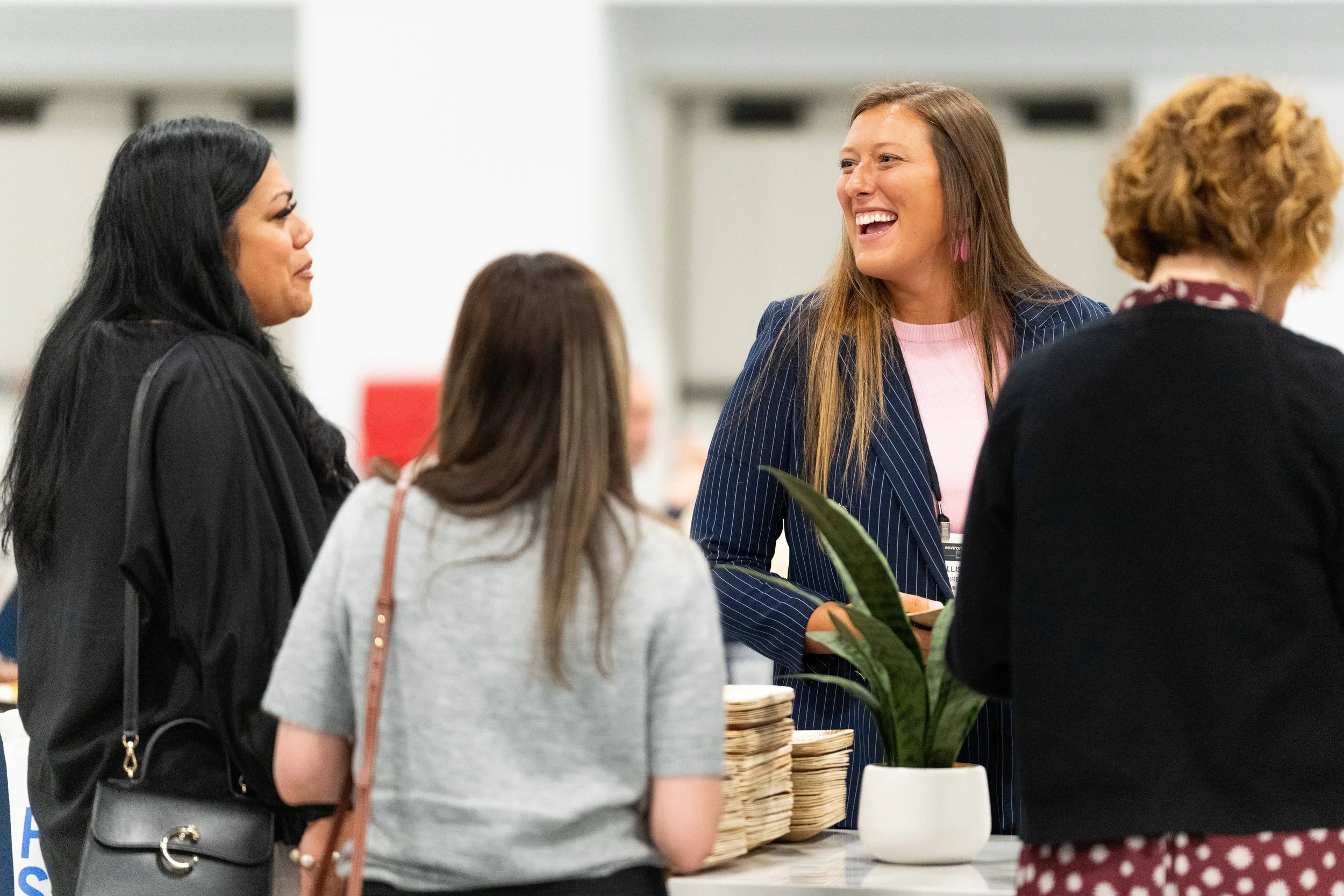 Attendees engaging in business networking at a product expo in the Central Bank Center, Lexington KY, professional event photography by 859 Photography.