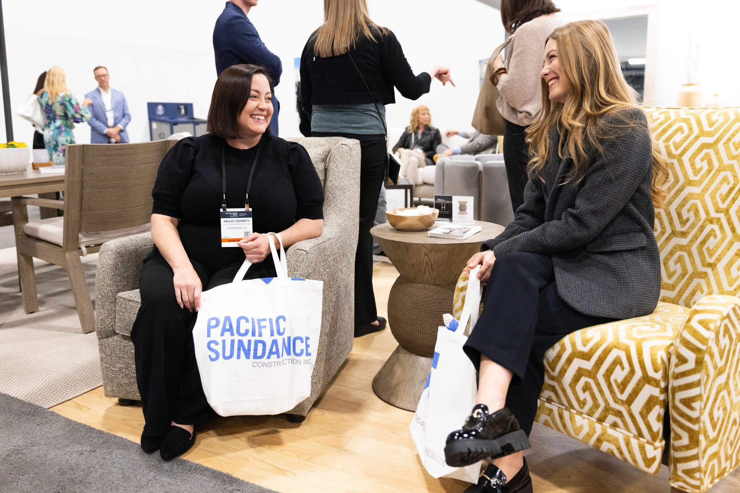 Professional networking at the Central Bank Center in Lexington, KY, featuring attendees from Pacific Sundance Construction Inc., captured by 859 Photography.