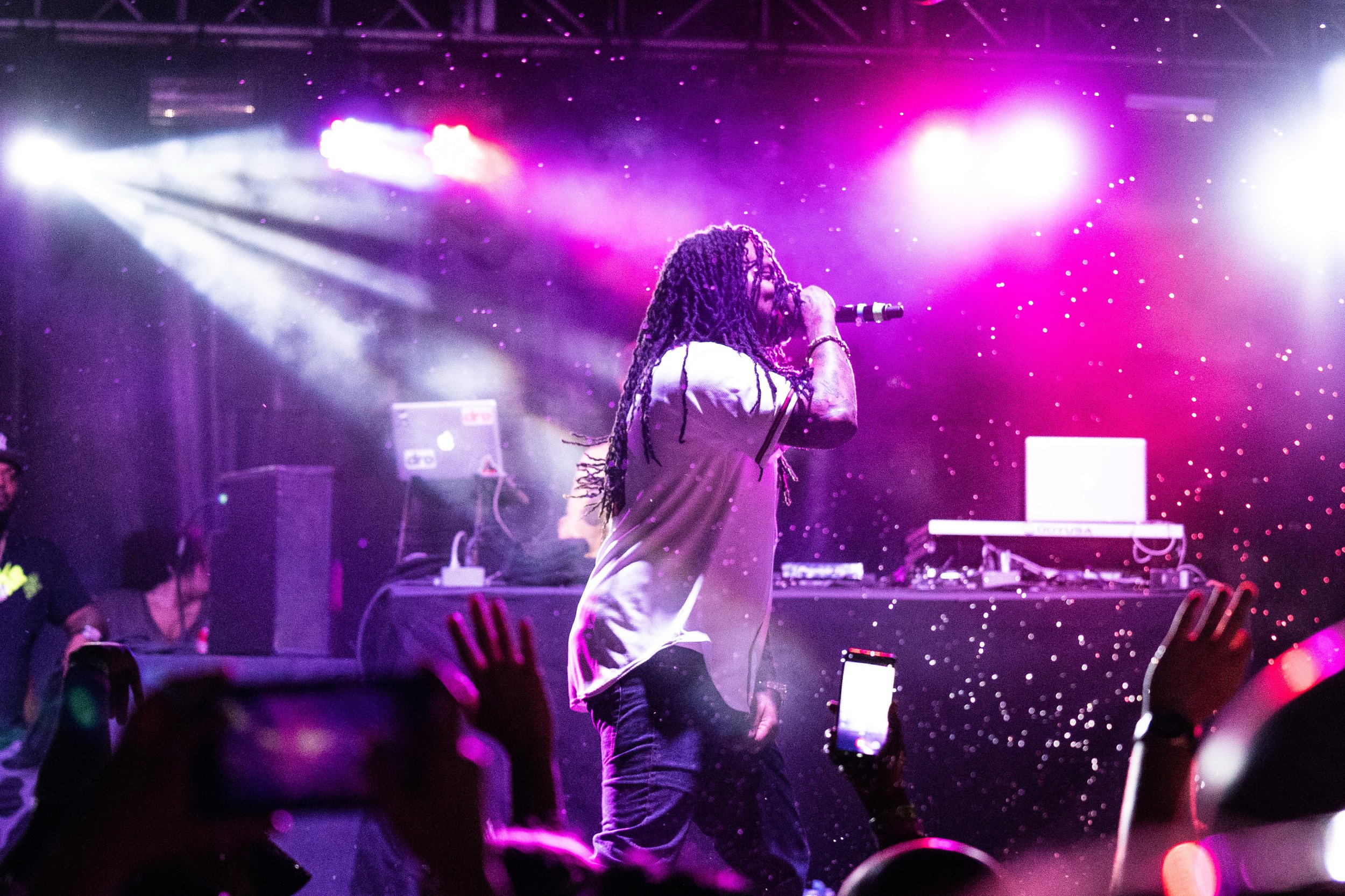 Live concert performance at Legends Field in Lexington, KY, featuring a vocalist with dreadlocks on a lit stage, captured by 859 Photography.