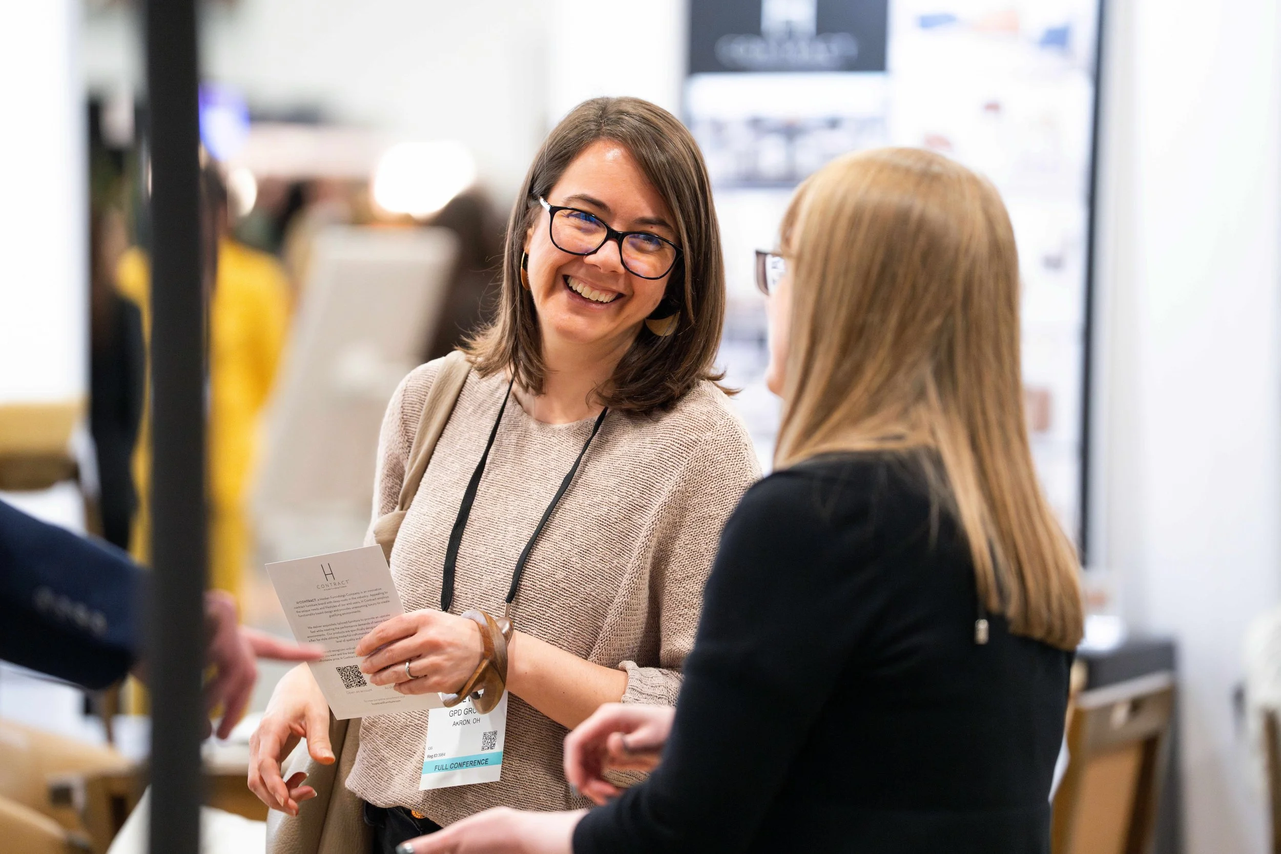 Candid networking between attendees at a Central Bank Center conference in Lexington, KY, featuring professional event media coverage by 859 Photography.