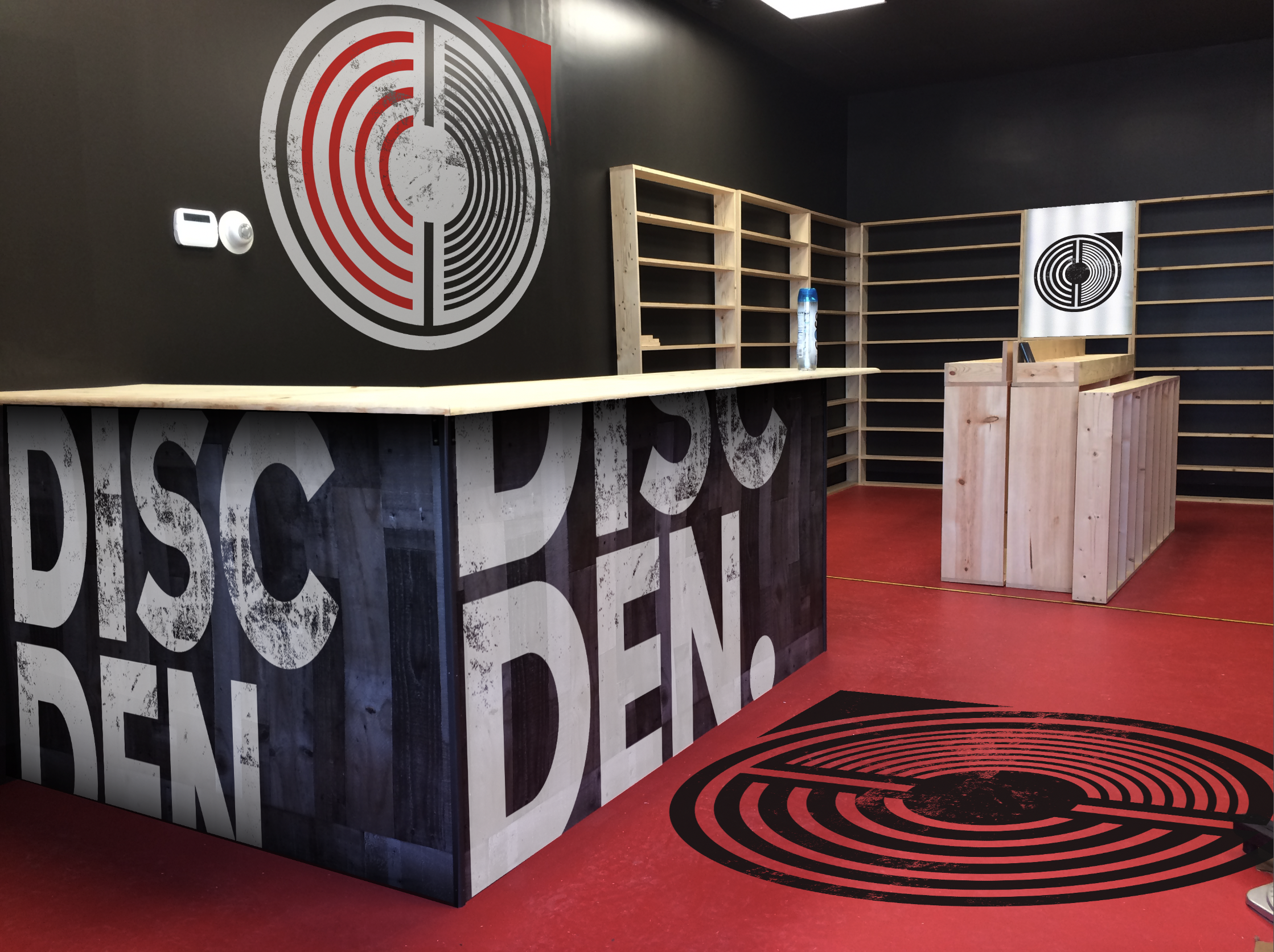 Logo and branded store interior design for Disc Den, an independent retail outlet selling music on CD's and Vinyl records, and movies on DVD's and Blu-Ray disc.