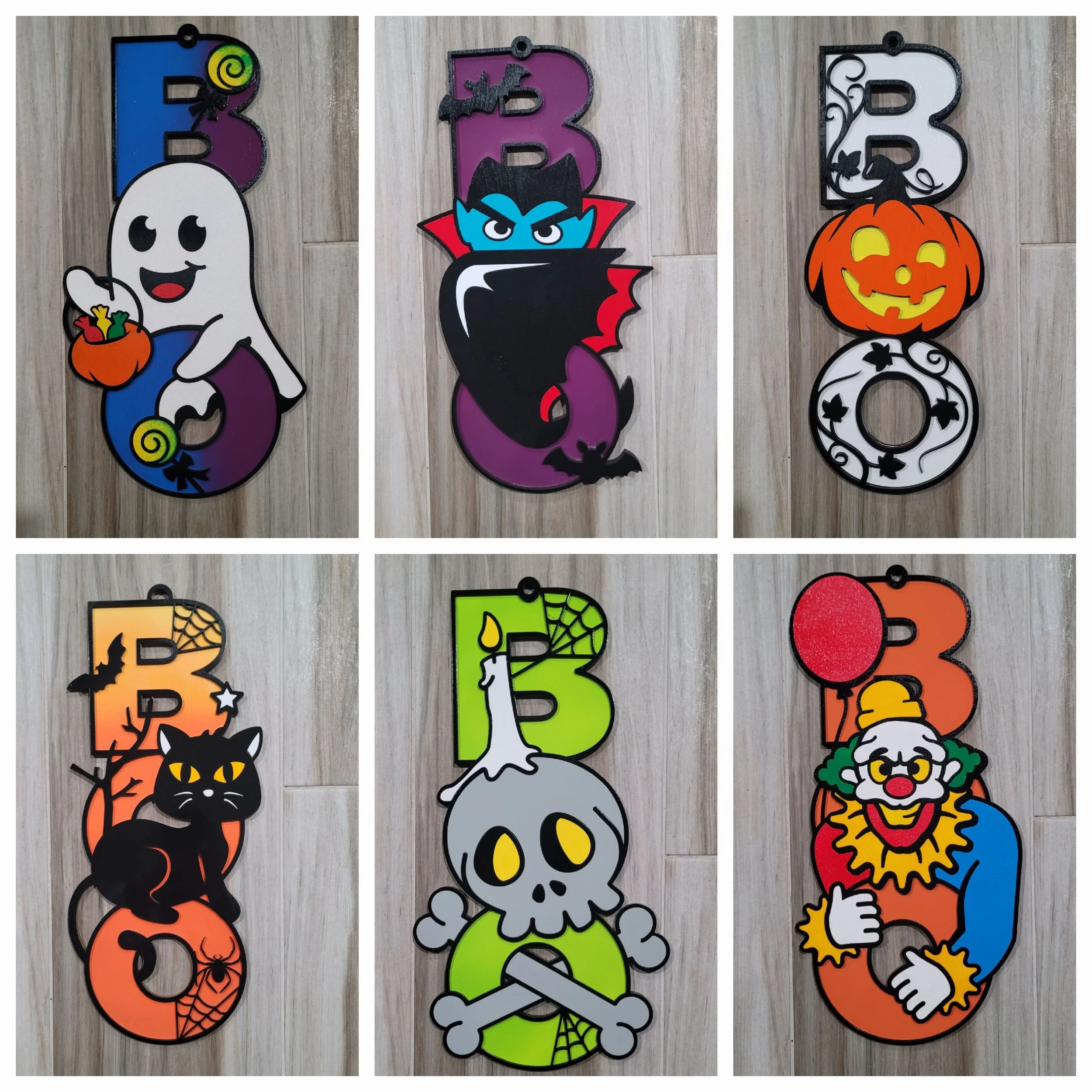 Halloween-themed decorative signs, each featuring different spooky or festive designs with vibrant colors.