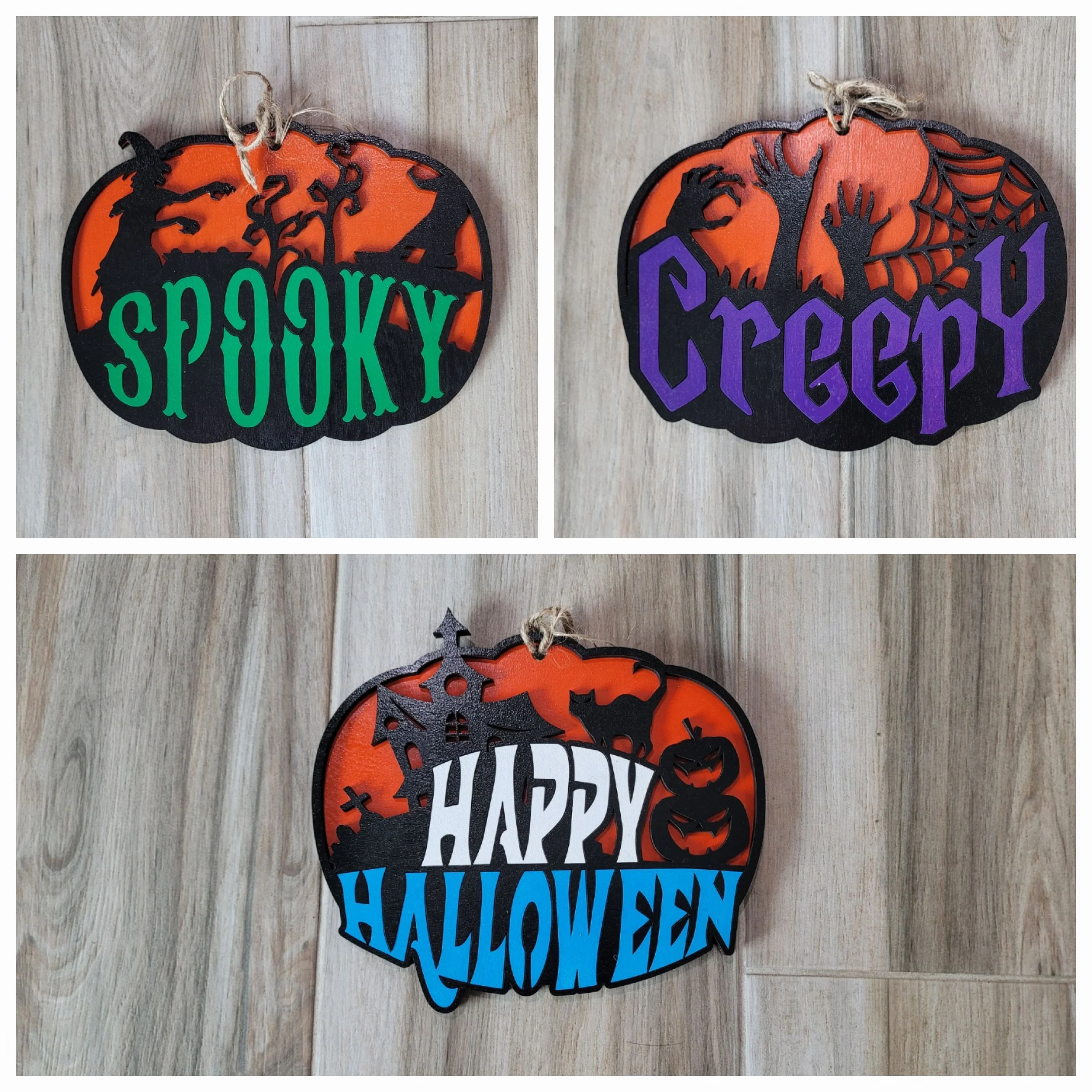 Decorative Halloween signs with the words 'Spooky', 'Creepy', and 'Happy Halloween', featuring spooky imagery like bats, ghosts, witches, and pumpkins on a wooden surface.