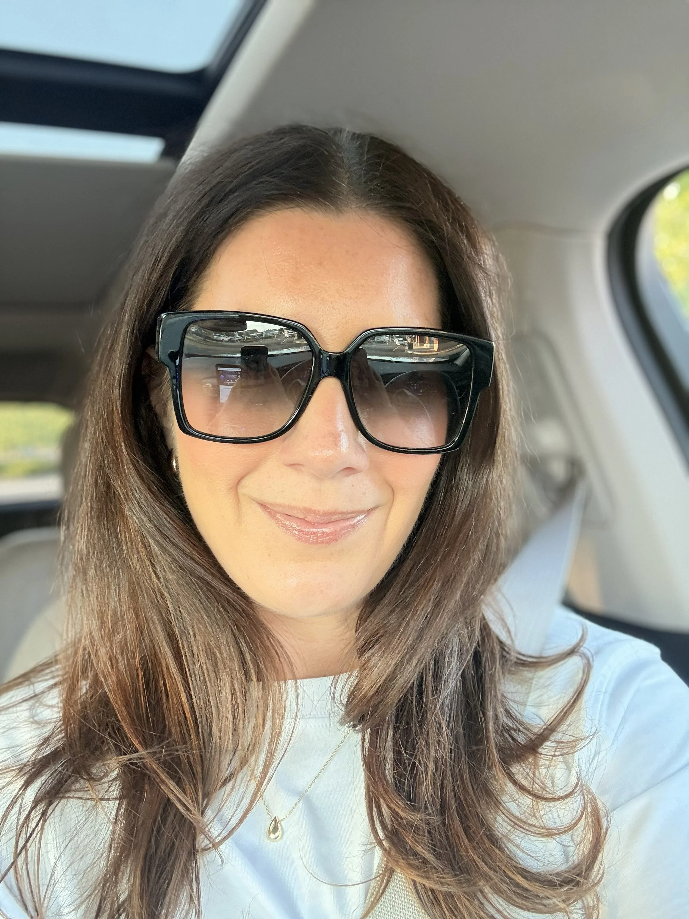 Danielle wearing oversized sunglasses