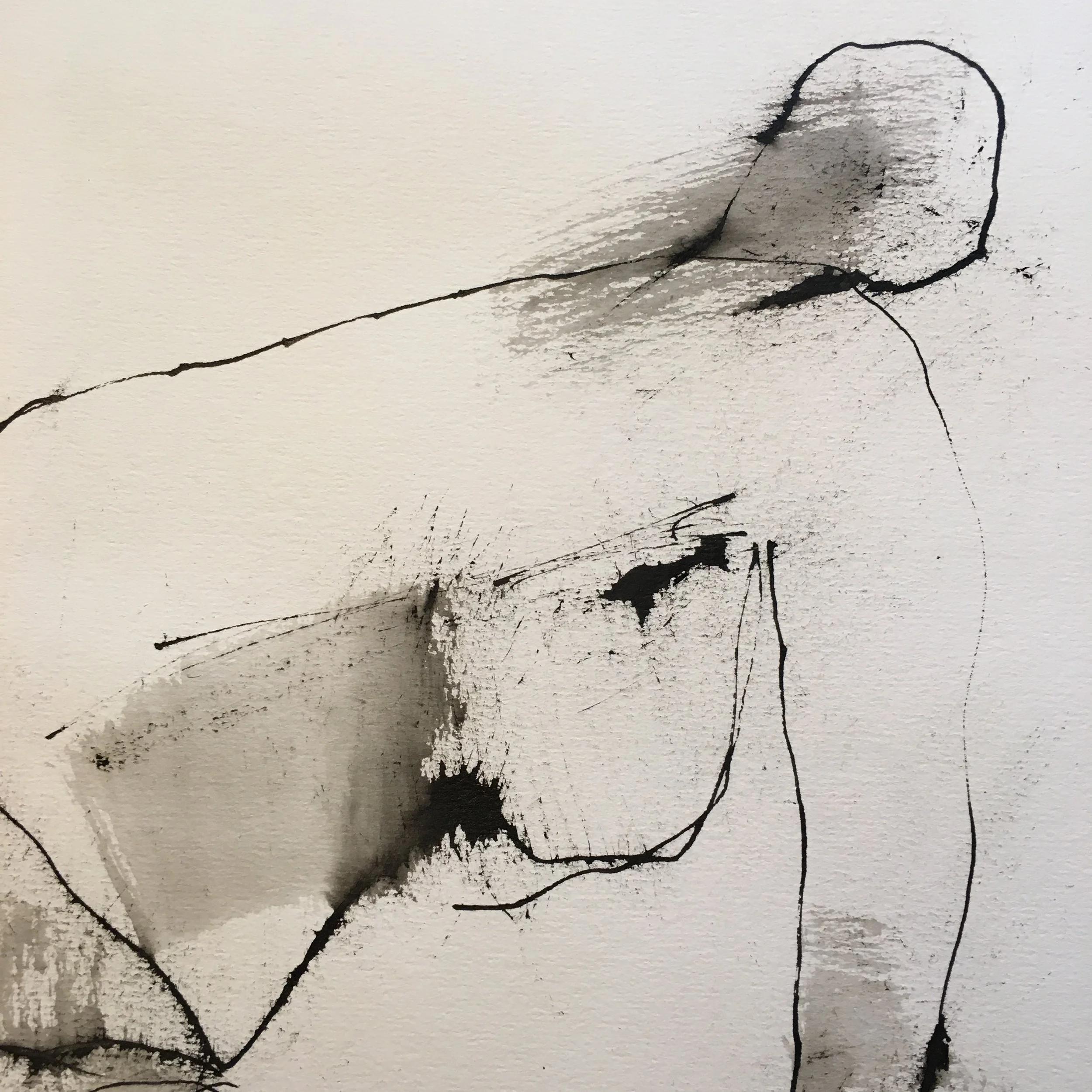 Abstract black ink drawing featuring minimalistic outlines of human faces on textured white paper.