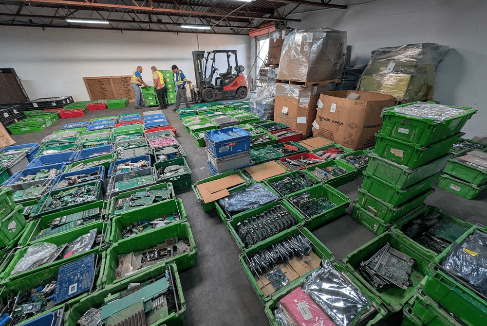 Electronic scrap staged in bins for processing at Texas Star Recycling, El Paso