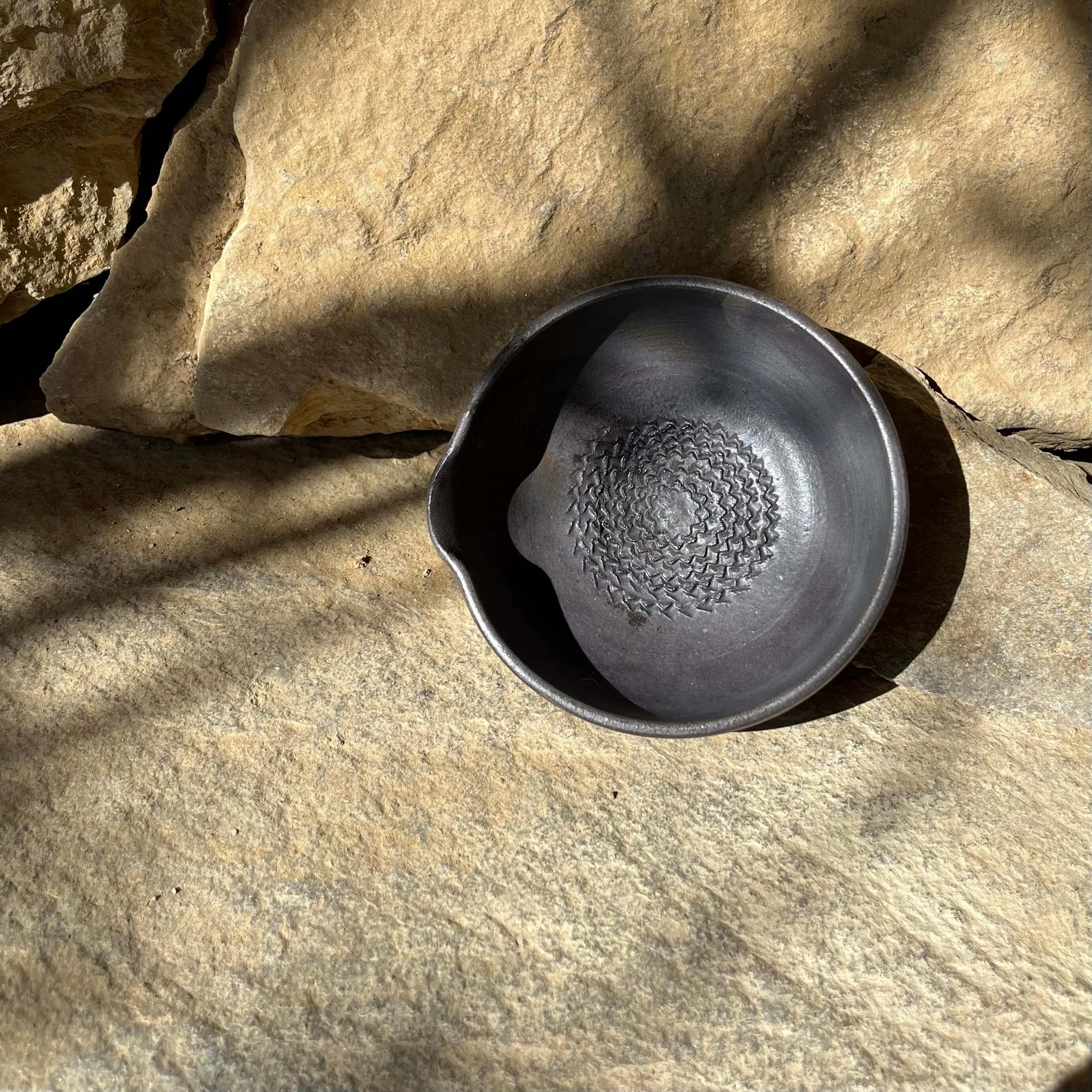 Darc solis garlic bowl in basalt 4.jpeg