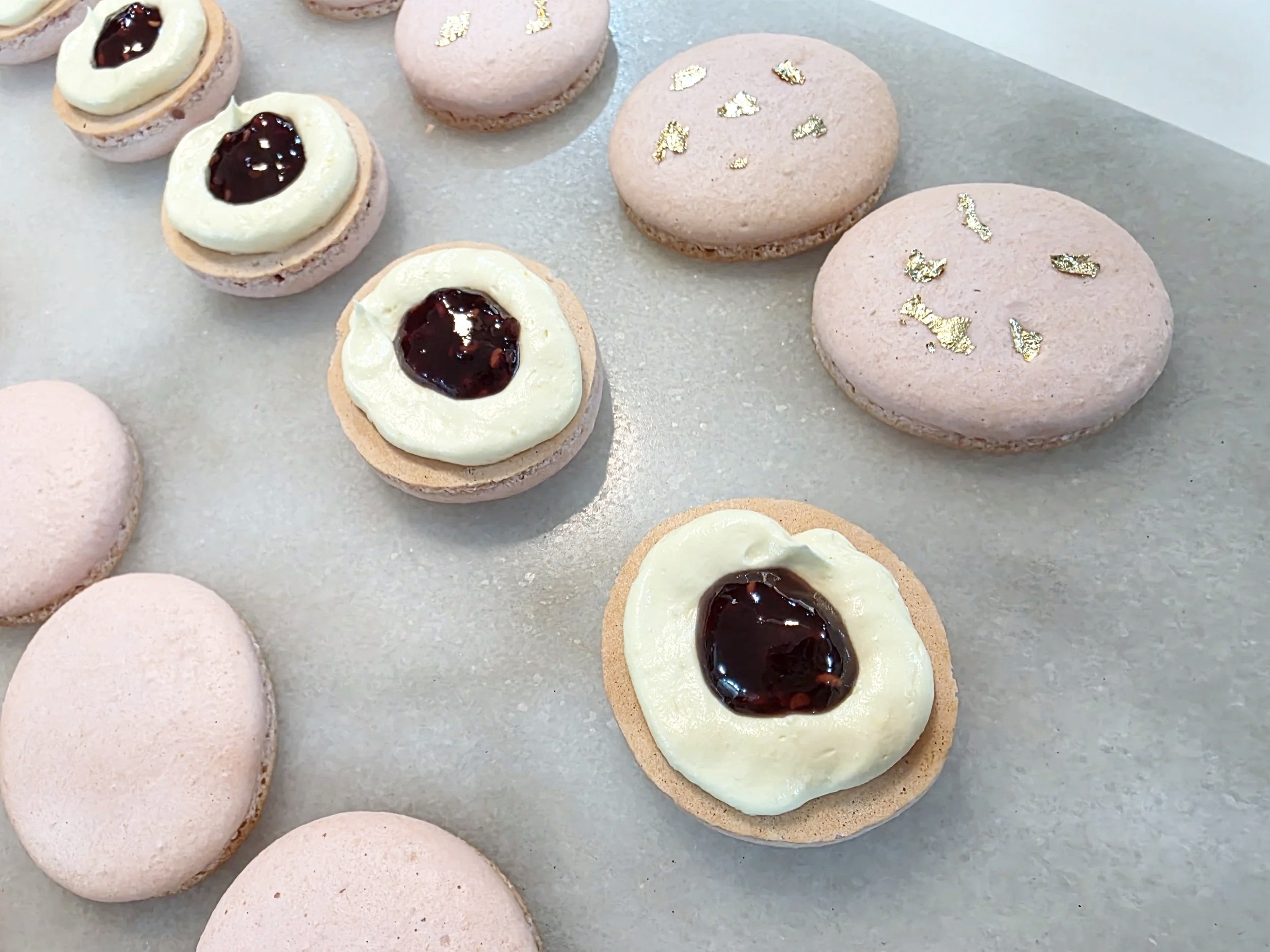 Rose Water Macaron Shells with Orange Blossom Buttercream and Raspberry Preserves