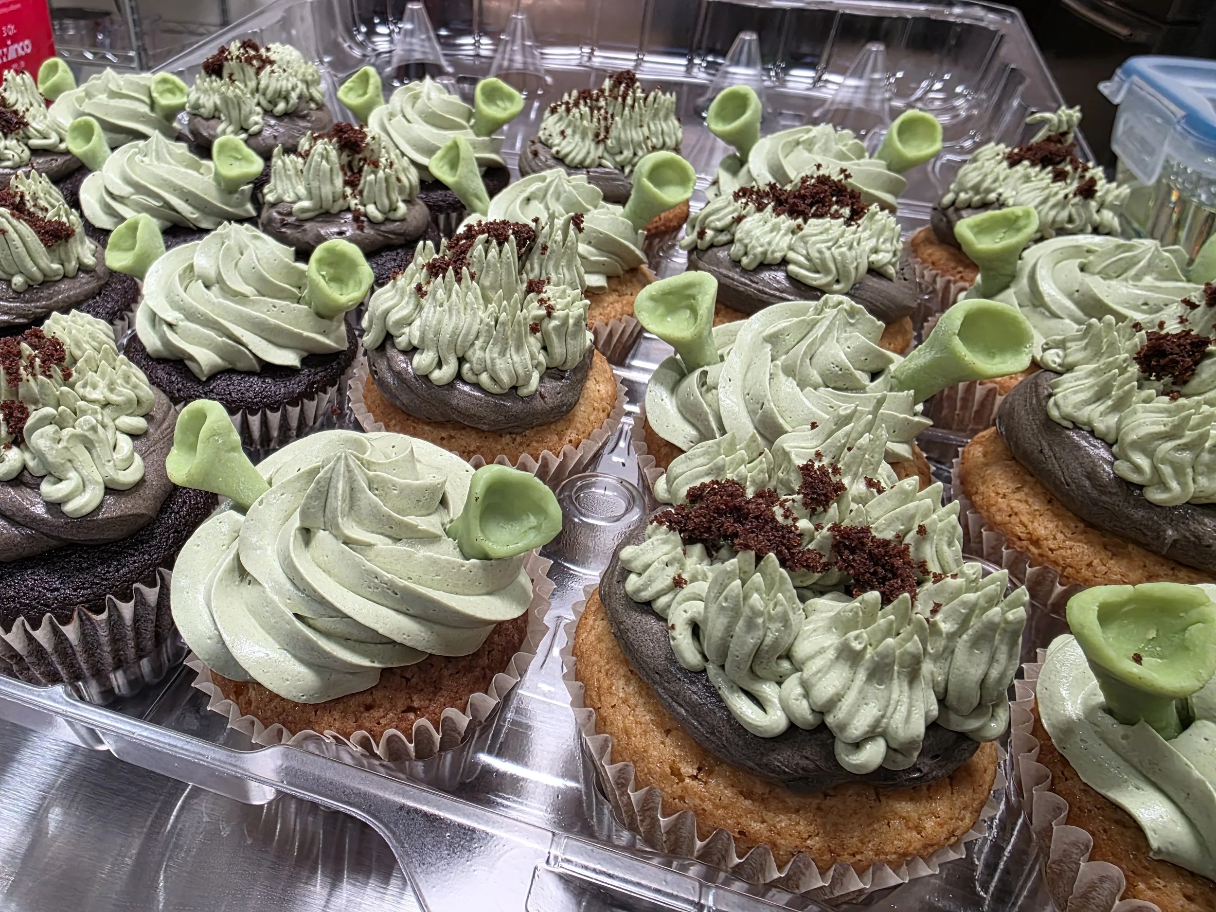 Vanilla Cupcakes with Chocolate and Vanilla Buttercream & Chocolate Cupcakes filled with Chocolate Ganache and topped with Vanilla Buttercream and White Molding Chocolate Ears