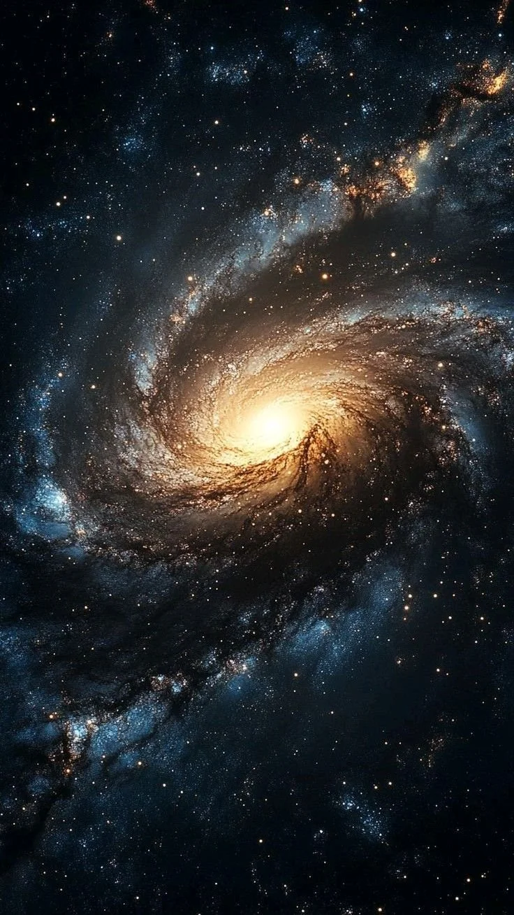 A stunning image of a galaxy with a bright center and spiral arms filled with stars and cosmic dust.