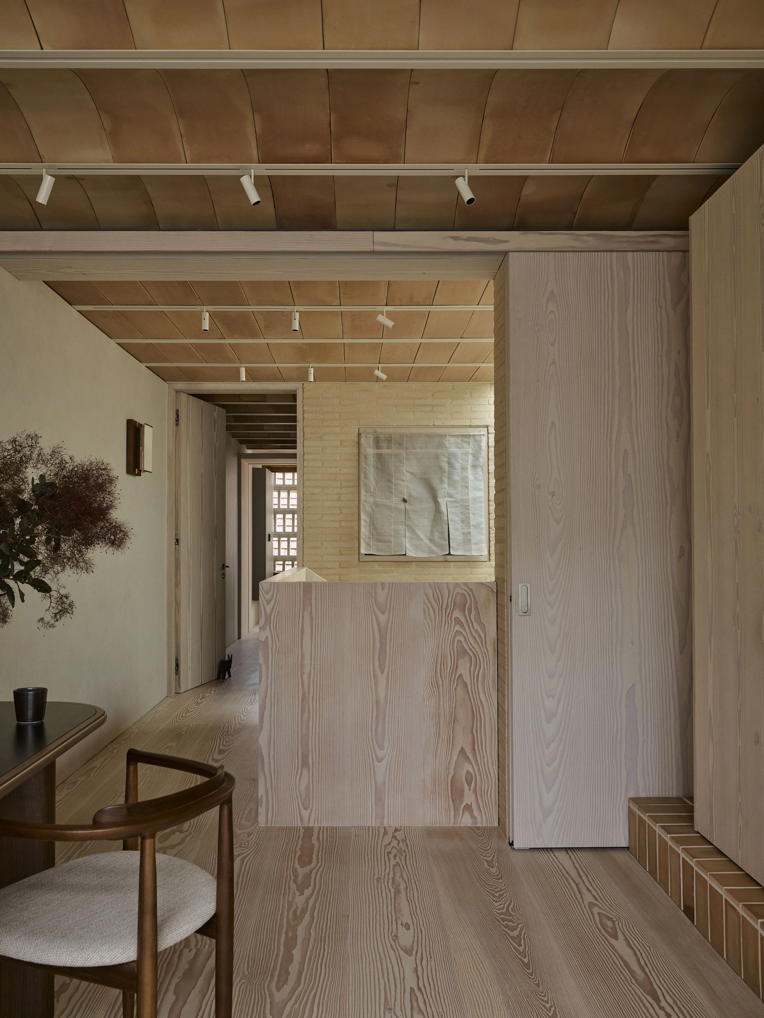 An eastern edition desk Dinesen doors in the Sydney terrace architect renovation, clay house, by Muci architects.