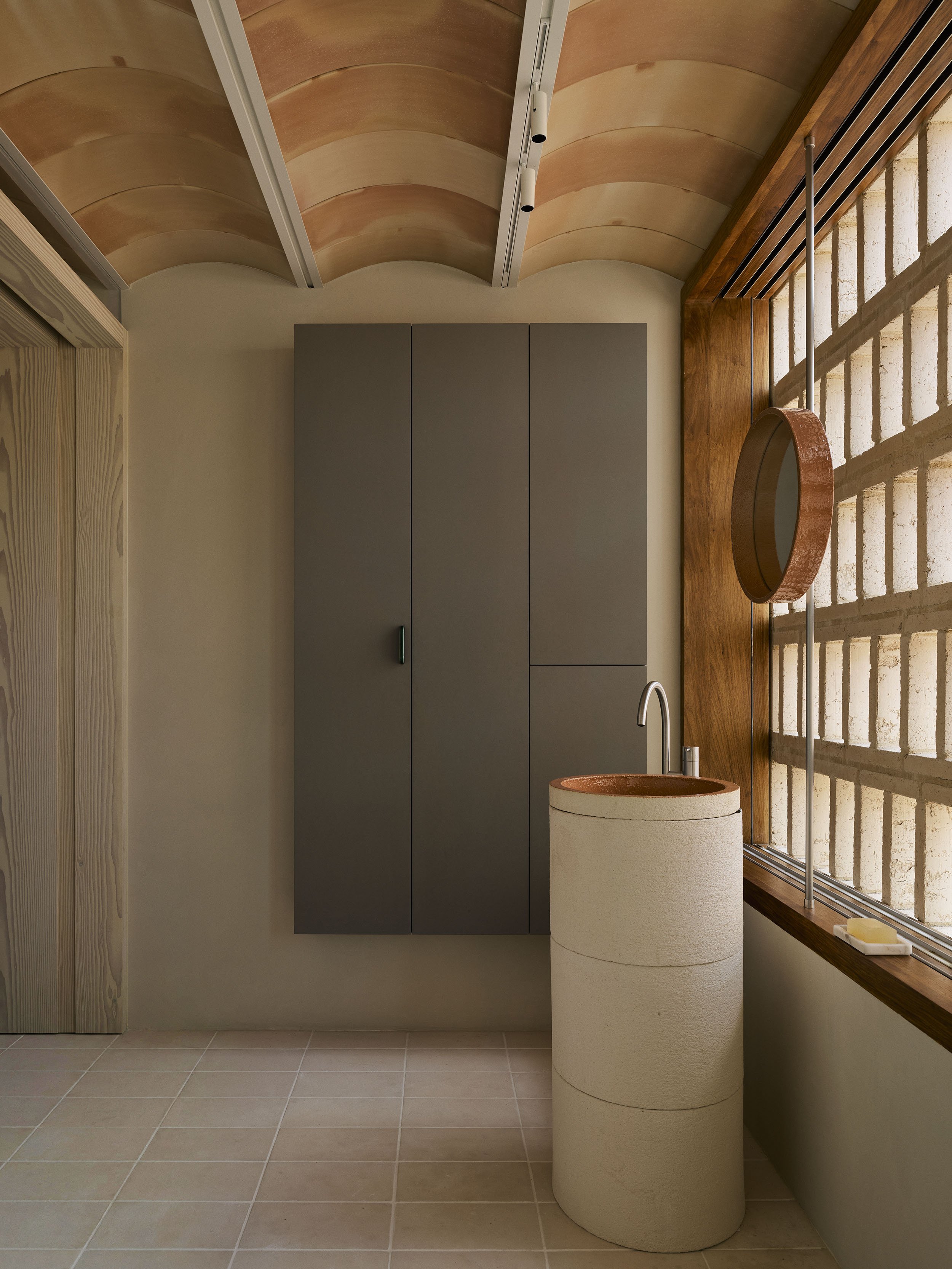 Atelier franssens column pedestal basin in the ensuite at Clay House Sydney terrace renovation by Muci architects