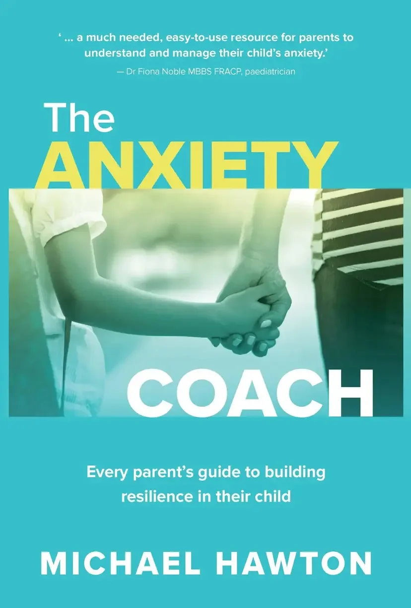 Book cover titled 'The Anxiety Coach' by Michael Hawton with a subtitle 'Every parent's guide to building resilience in their child.' Features an image of two people shaking hands.