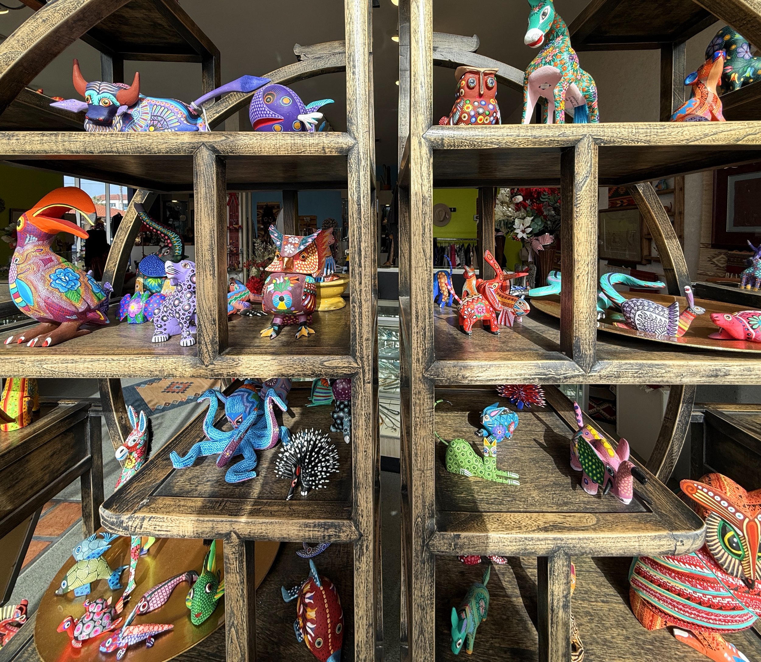 A display of wonderful hand-carved wood folk art figures.