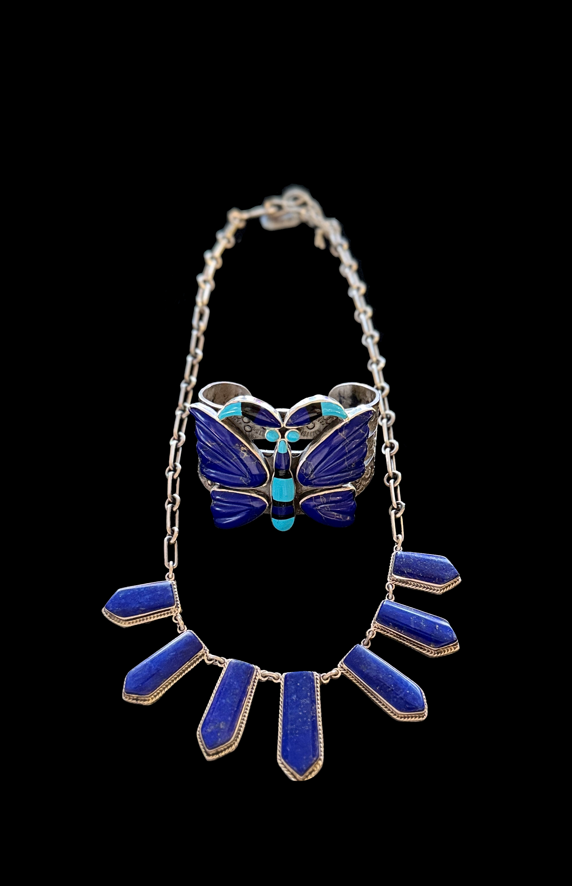 A breathtaking lapis lazuli necklace and butterfly bracelet.
