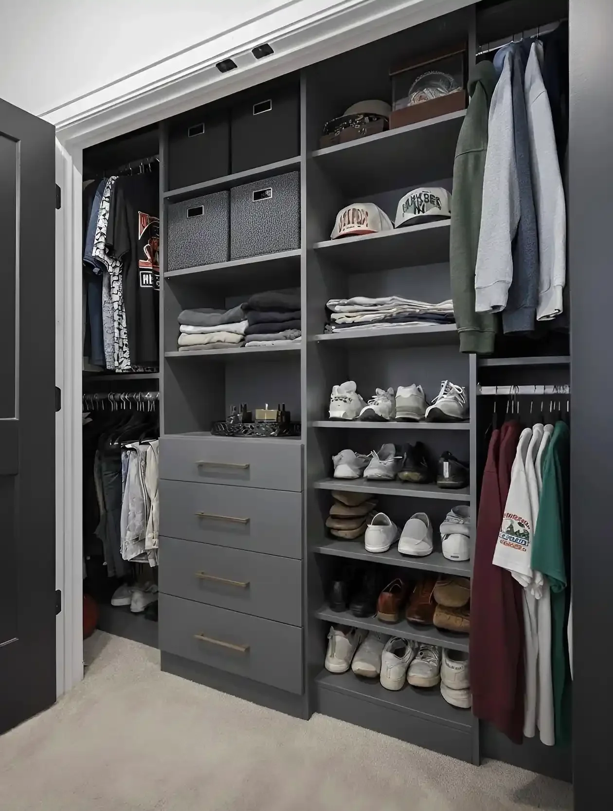 Organized closet with shelves containing clothes, shoes, hats, and storage bins.
