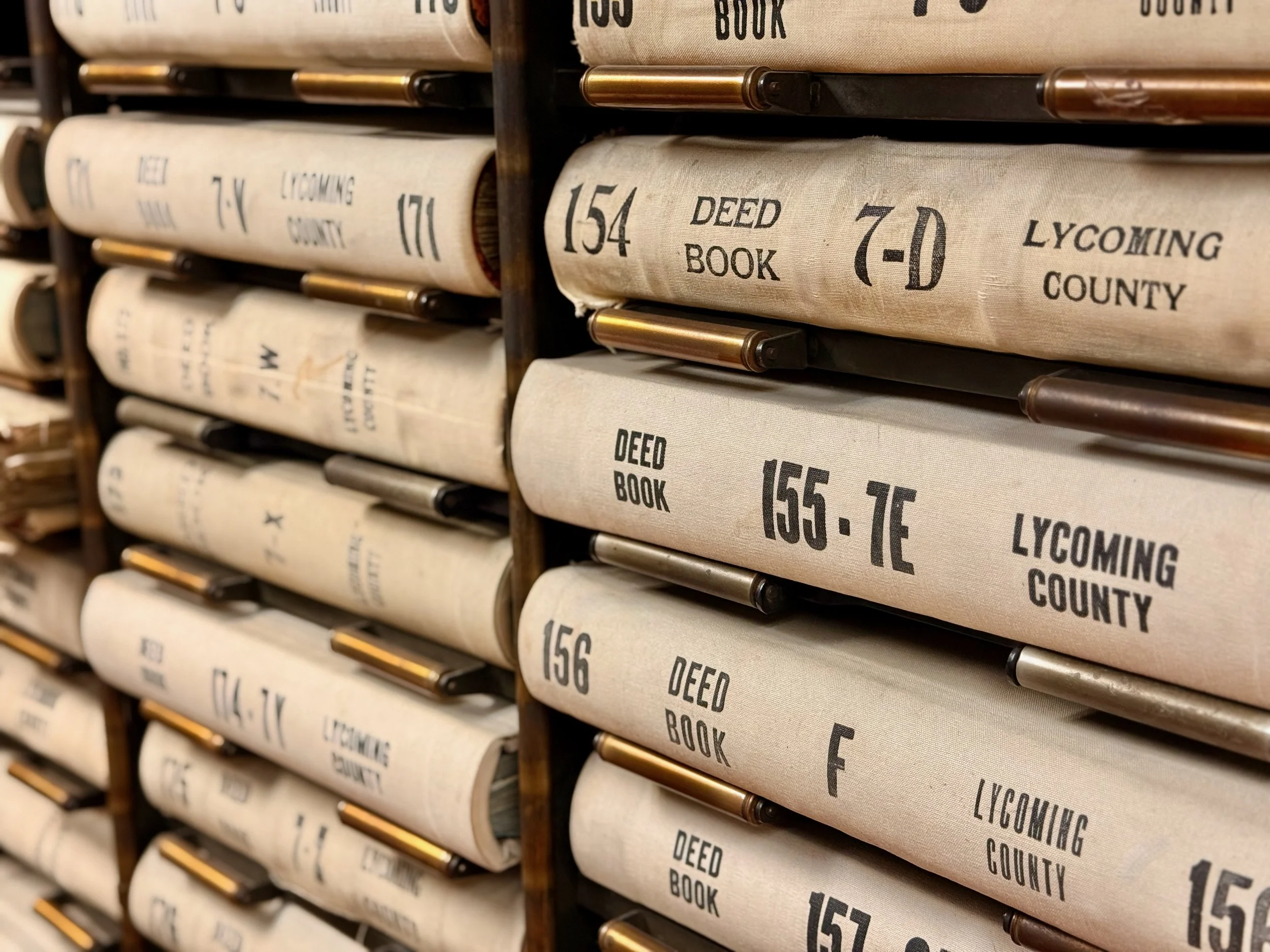 File drawers labeled with deed book and county numbers, part of a record storage system in Lycoming County.