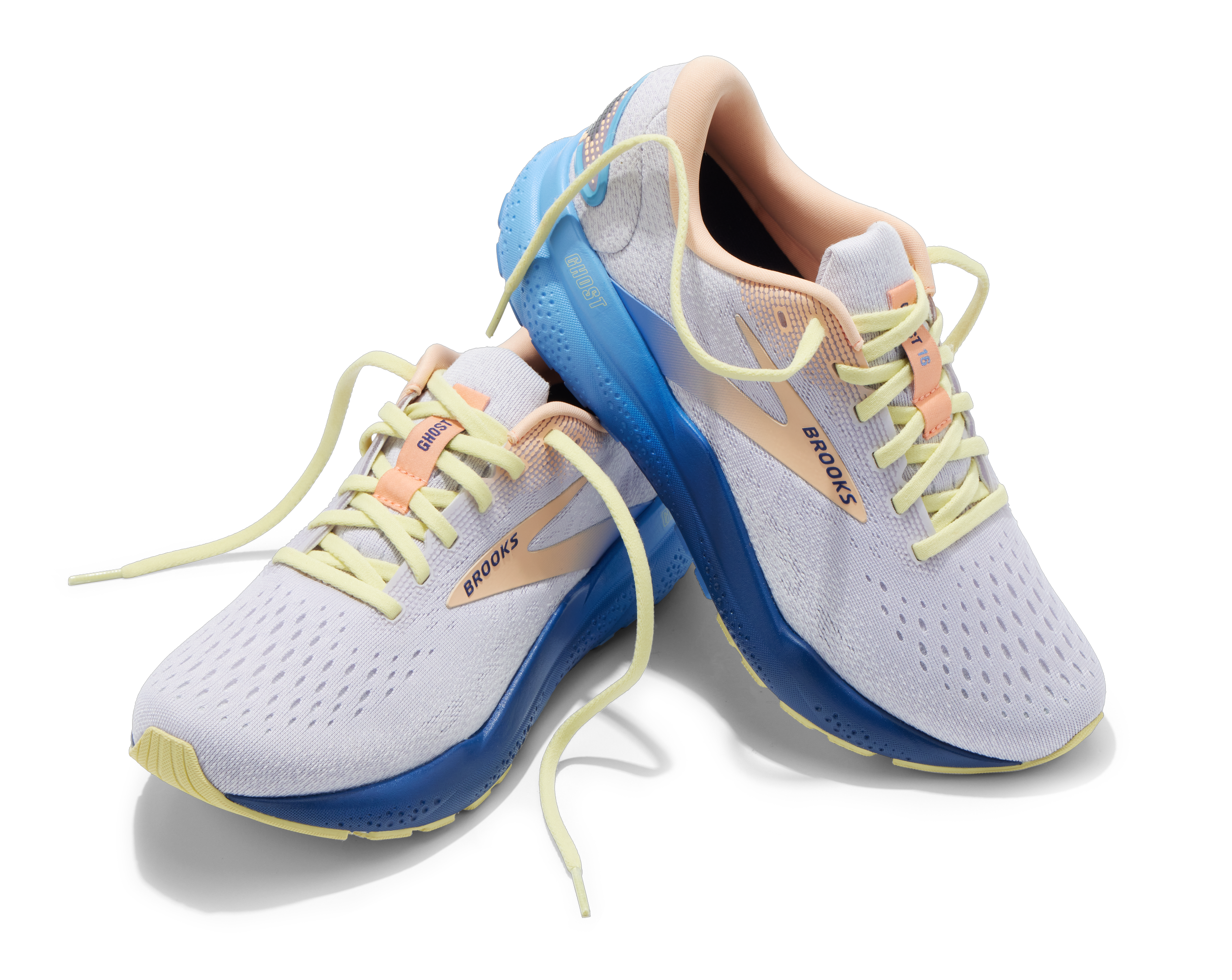 White and blue Brooks Ghost running shoes with yellow laces on a black background.