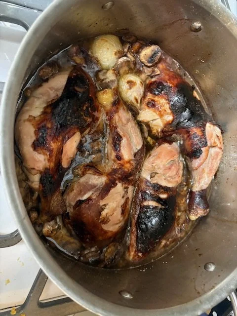 A pot with some sketchy-looking coq au vin