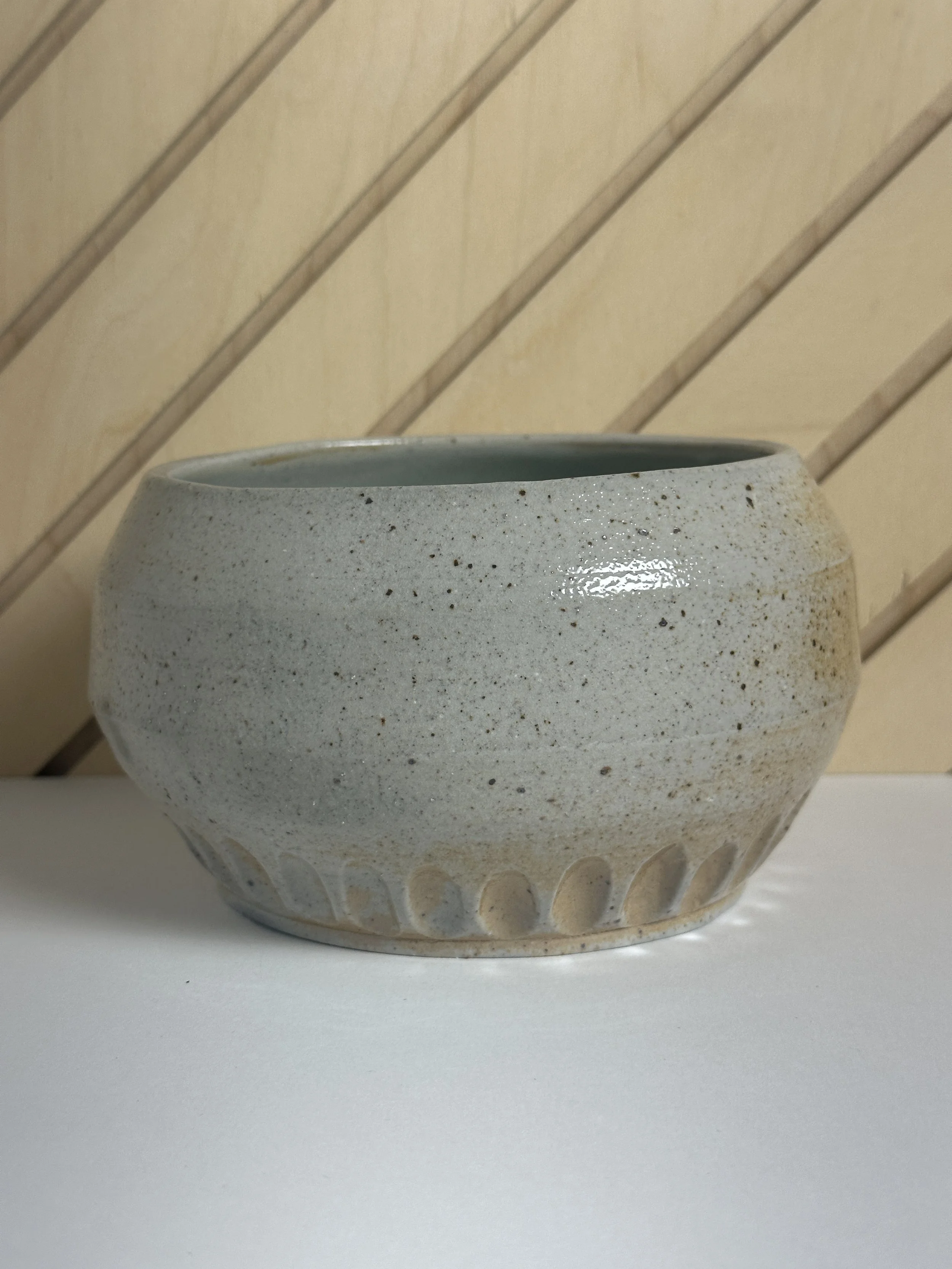 angled carved soda fired bowl