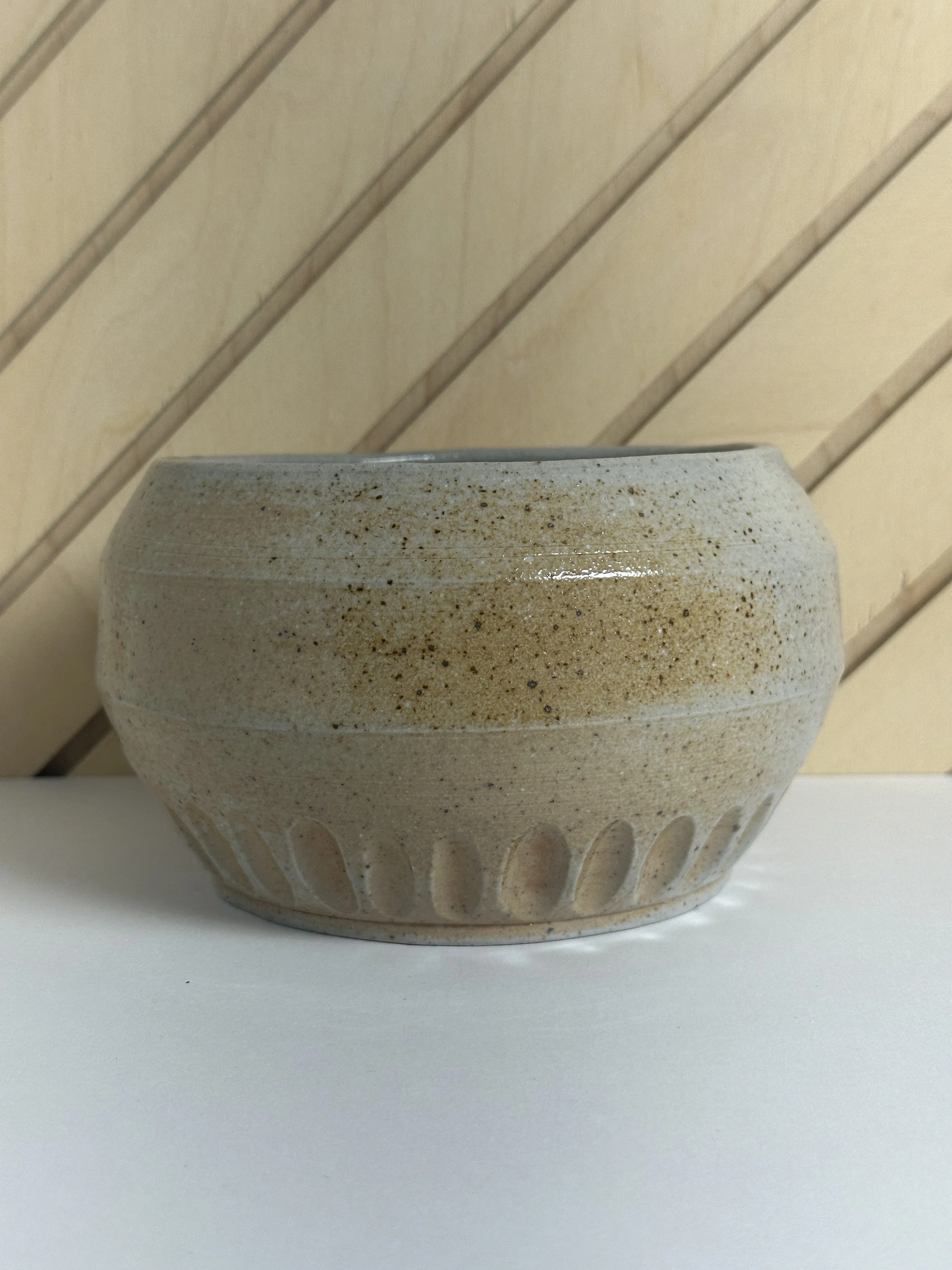 angled carved soda fired bowl