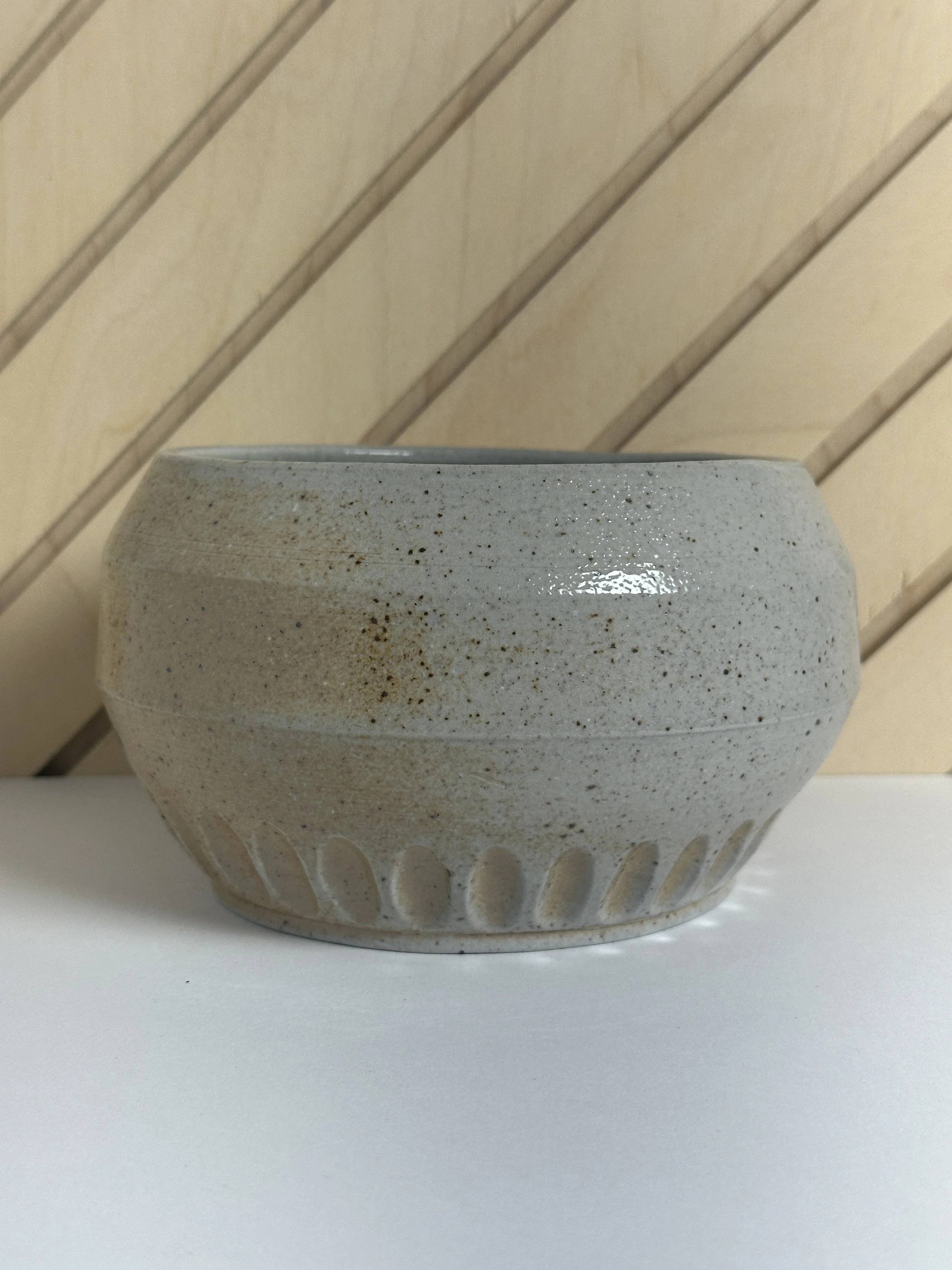 angled carved soda fired bowl