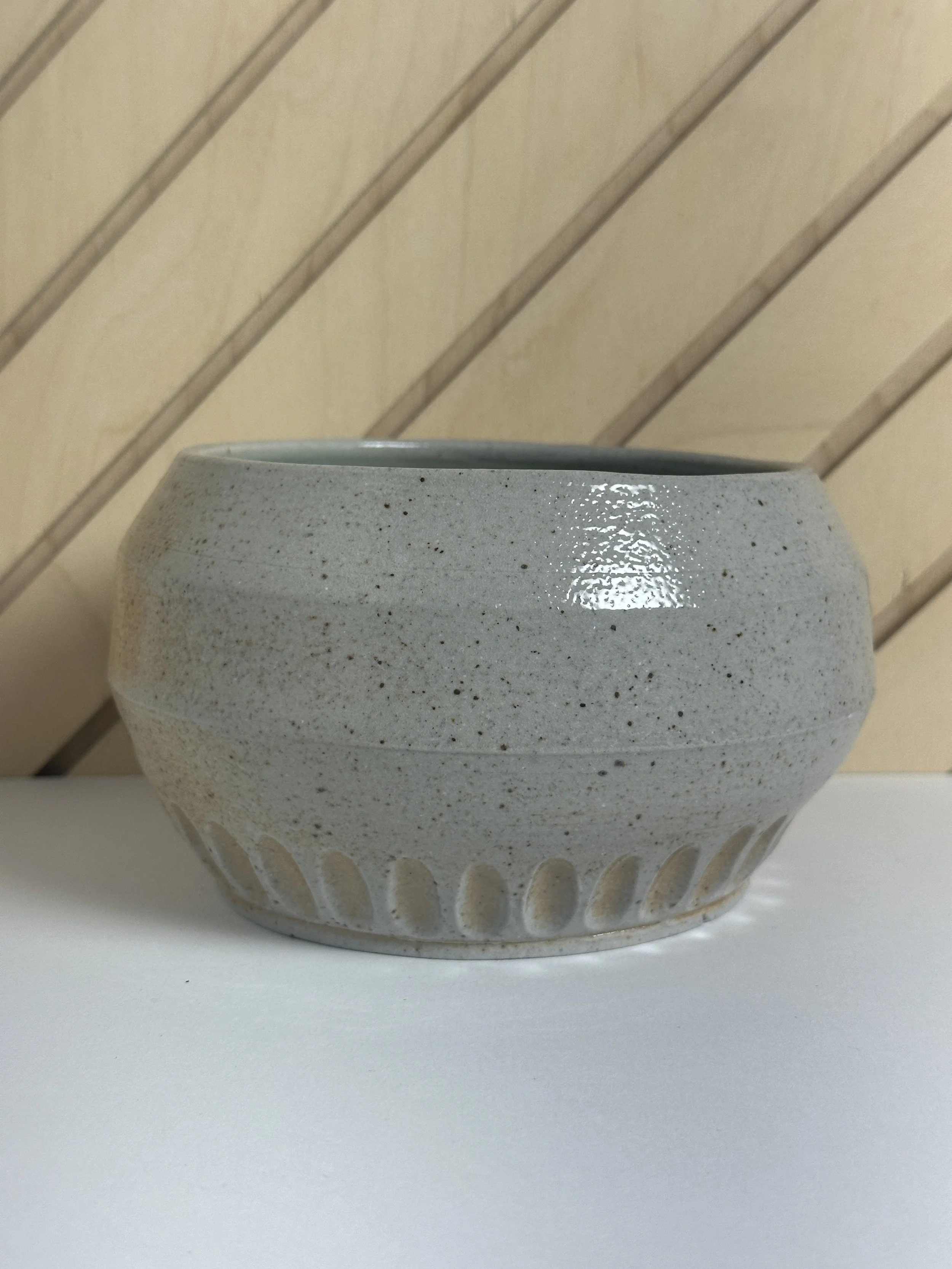 angled carved soda fired bowl